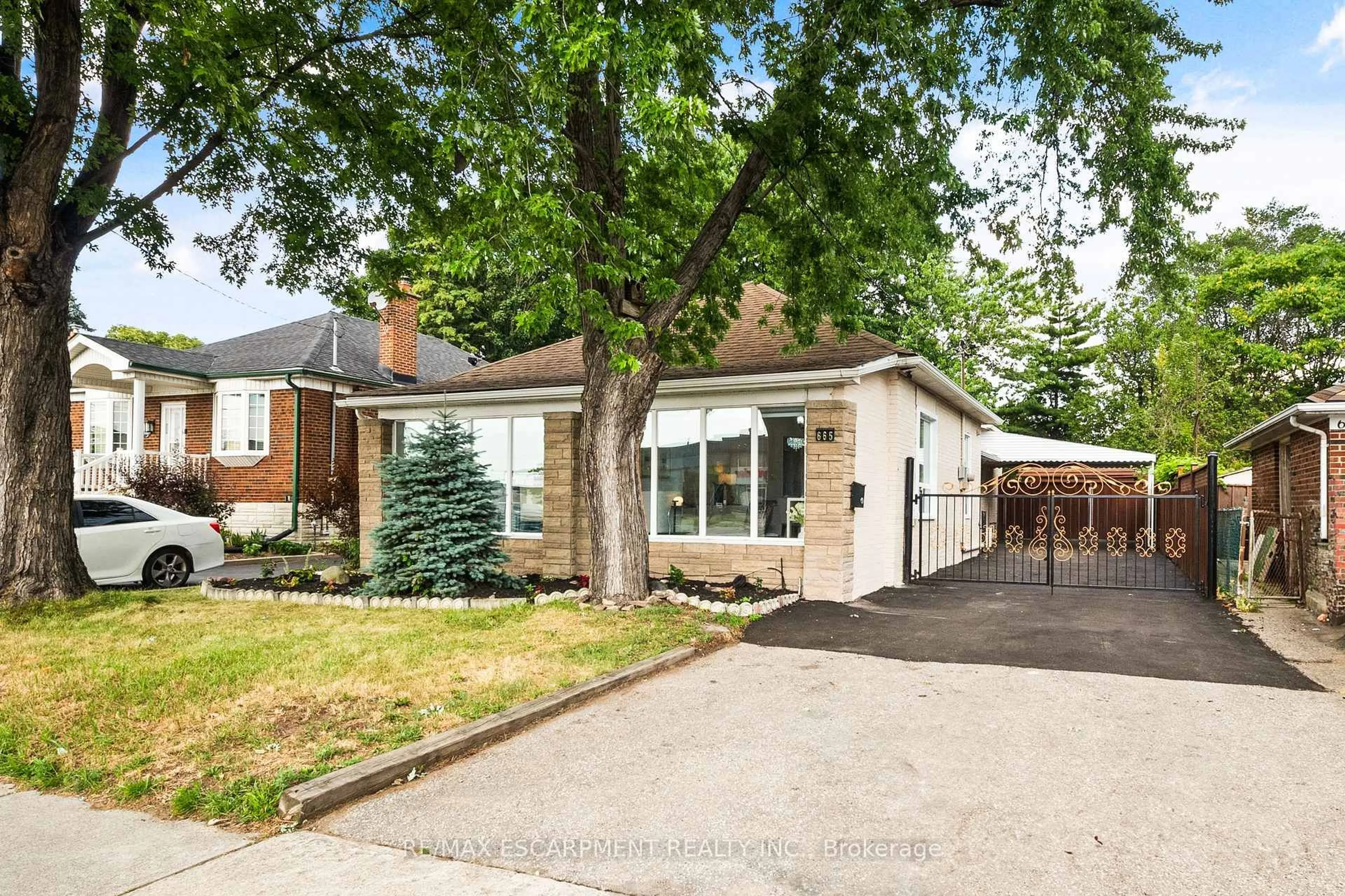 Home with brick exterior material, street for 665 Kipling Ave, Toronto Ontario M8Z 5G2