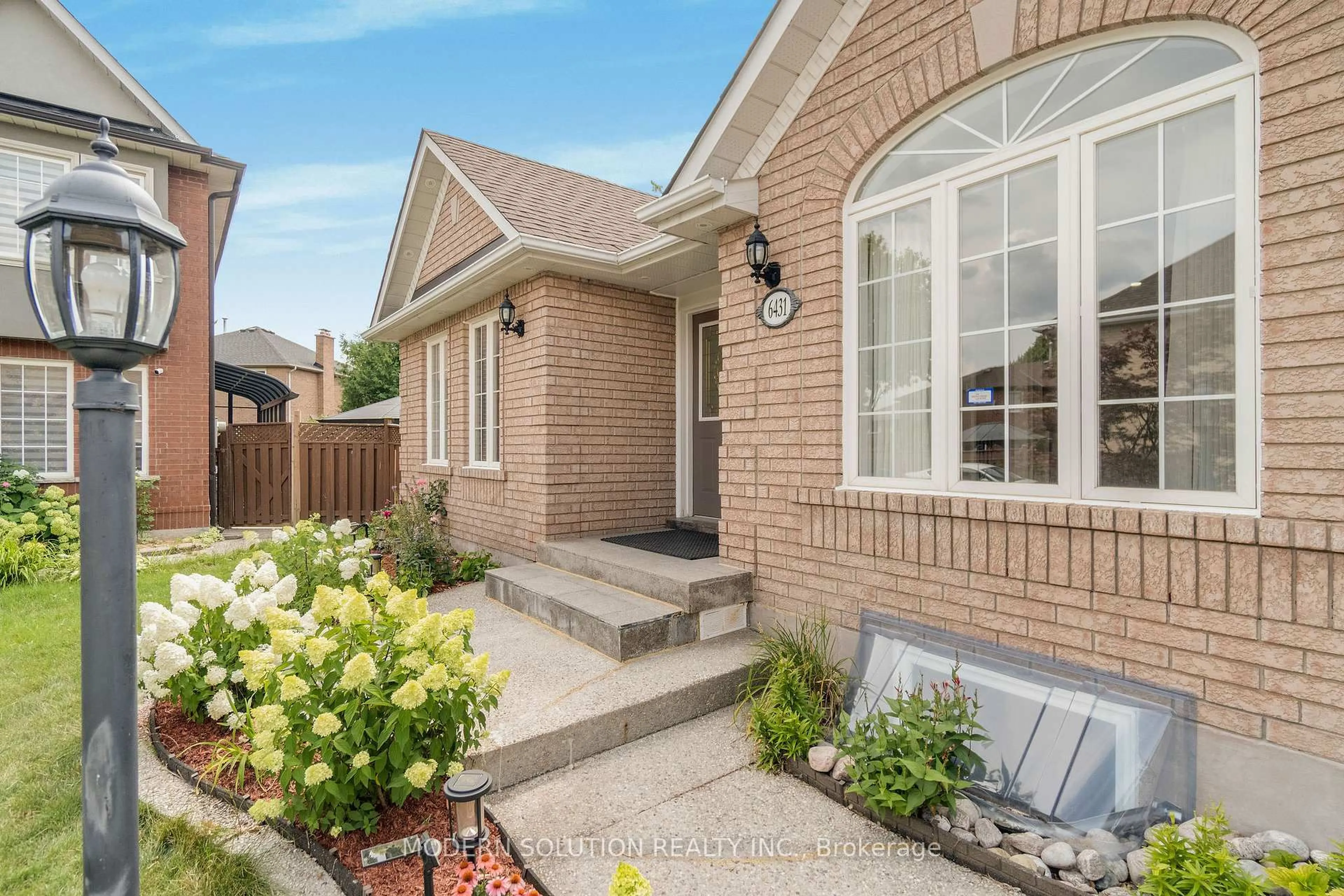 Home with brick exterior material, street for 6431 Tenth Line, Mississauga Ontario L5N 7J5