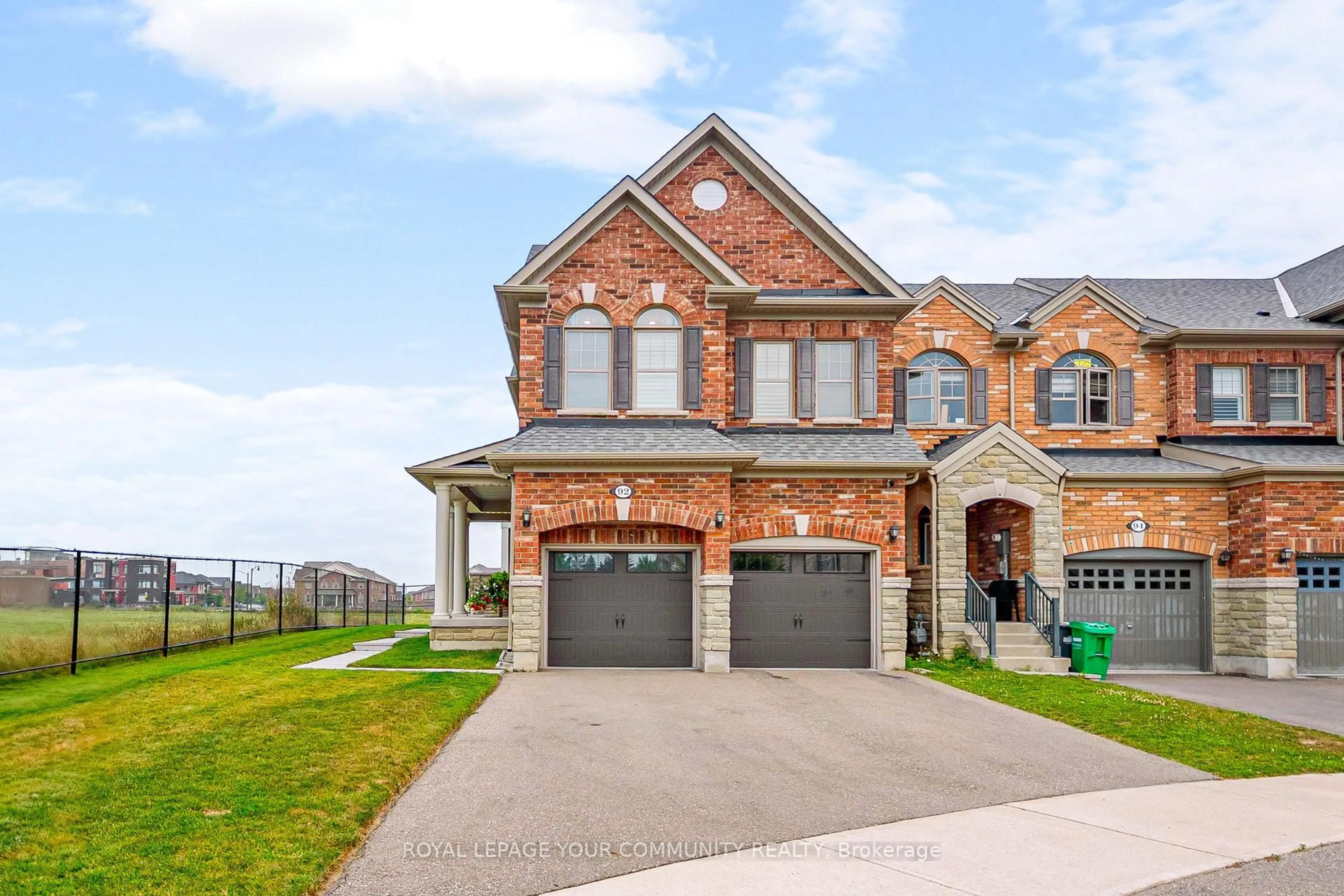 Home with brick exterior material, street for 92 Padbury Tr, Brampton Ontario L7A 4V4