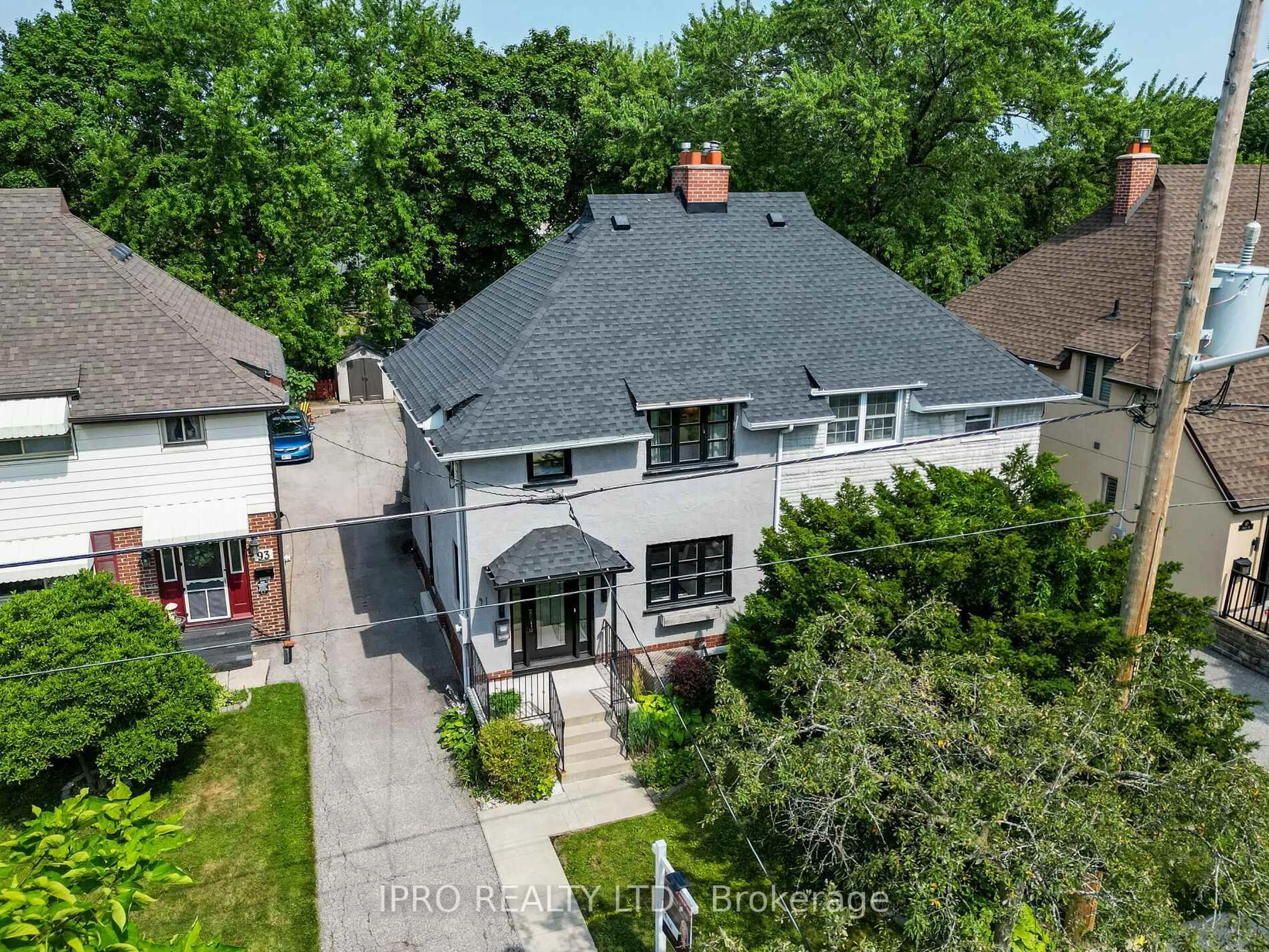 A pic from outside/outdoor area/front of a property/back of a property/a pic from drone, street for 91 Eighth St, Toronto Ontario M8V 3C5