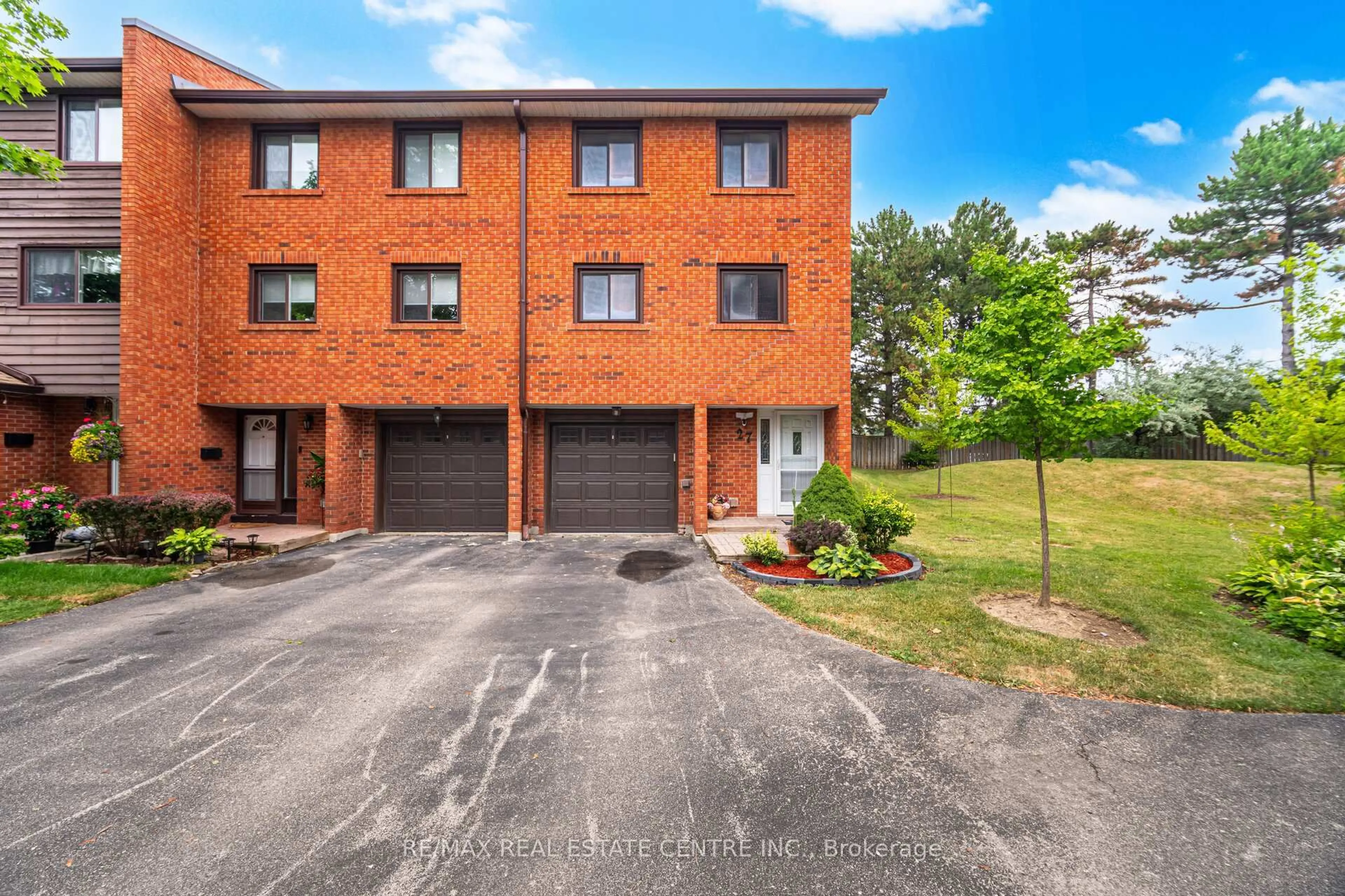 Home with brick exterior material, street for 4230 Fieldgate Dr #27, Mississauga Ontario L4W 2M5