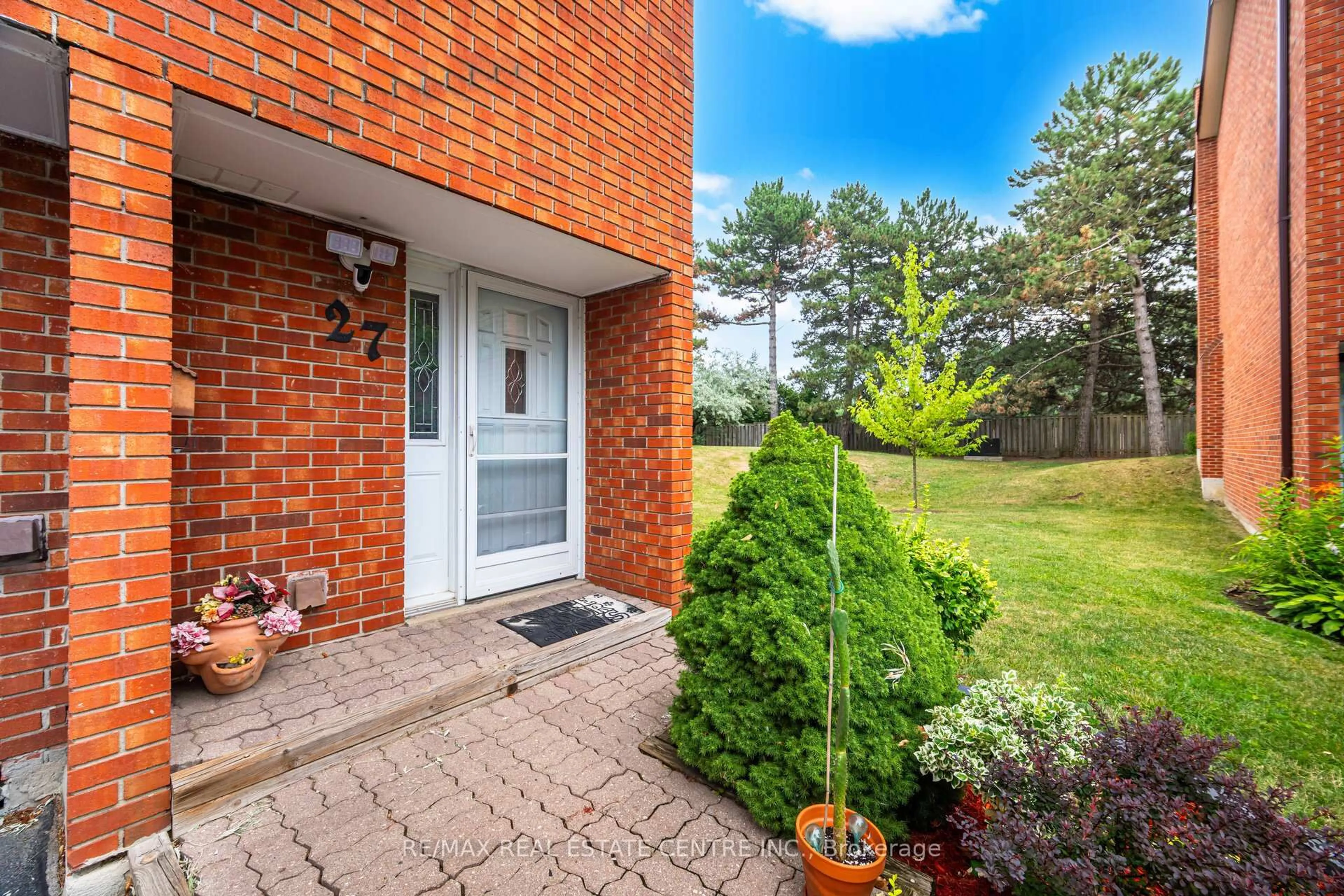 Home with brick exterior material, street for 4230 Fieldgate Dr #27, Mississauga Ontario L4W 2M5