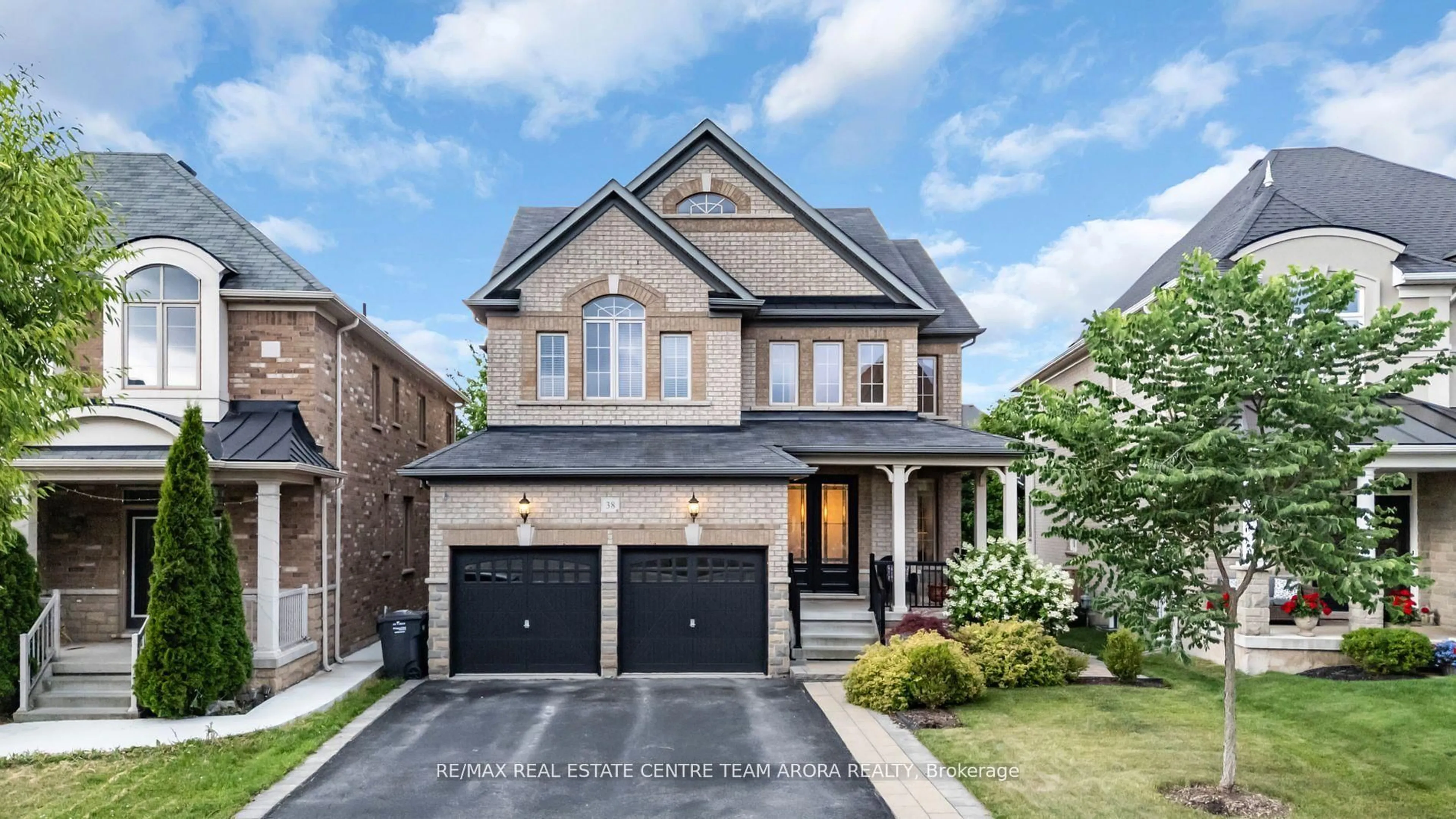 Home with brick exterior material, street for 38 Intrigue Tr, Brampton Ontario L6X 0W9