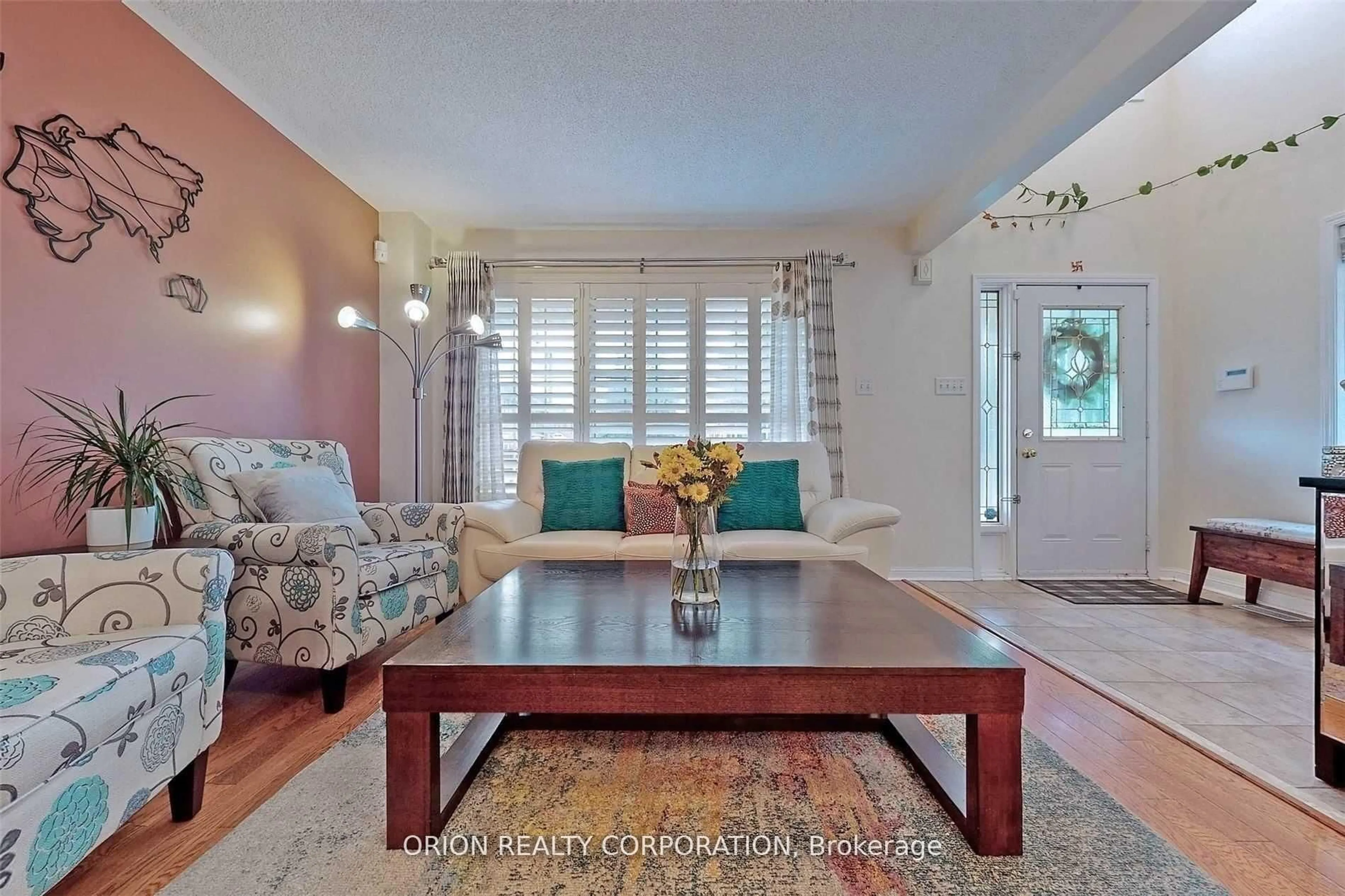 Living room with furniture, wood/laminate floor for 2321 Oakhaven Dr, Oakville Ontario L6M 3Z1
