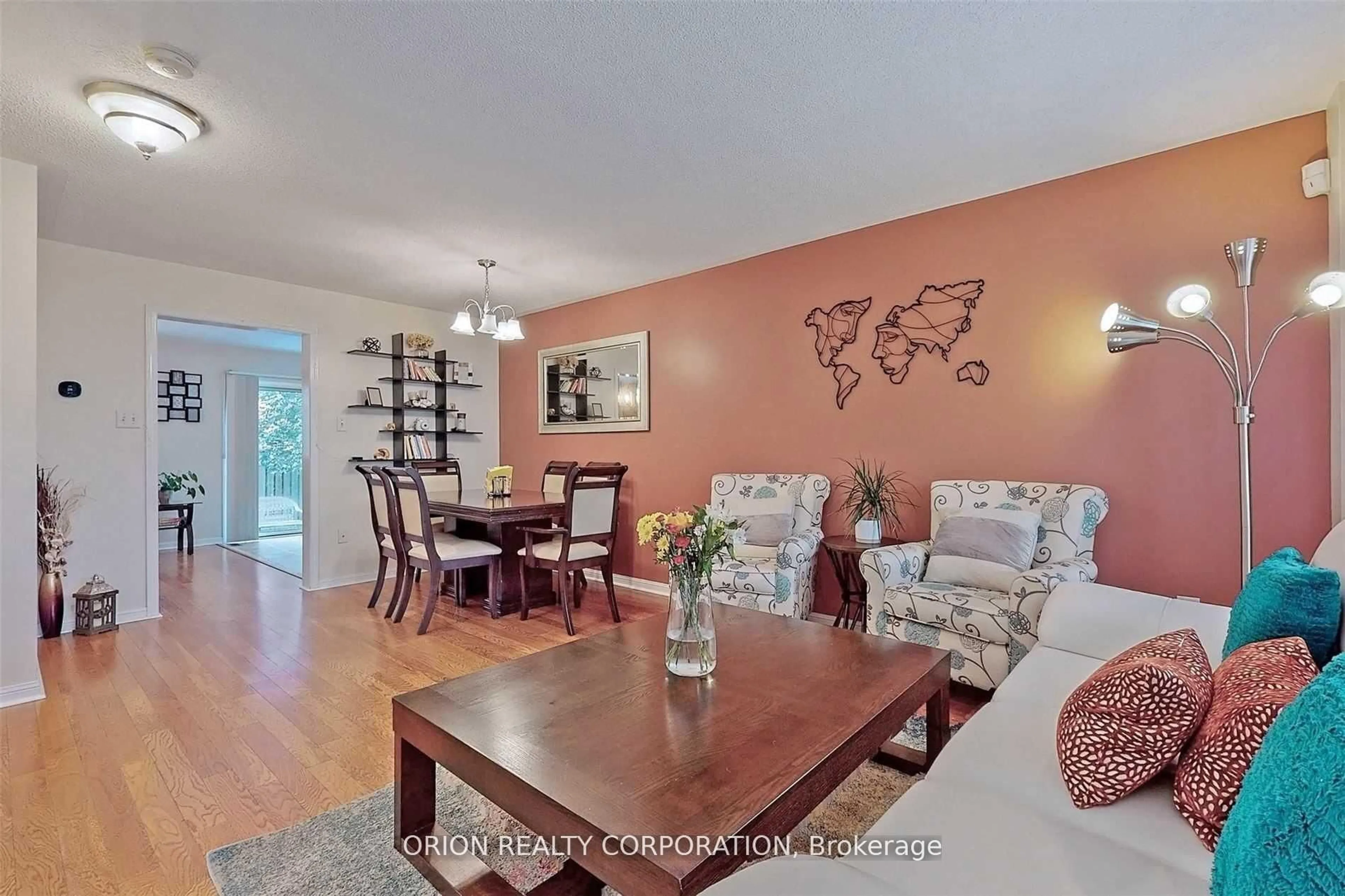 Living room with furniture, wood/laminate floor for 2321 Oakhaven Dr, Oakville Ontario L6M 3Z1