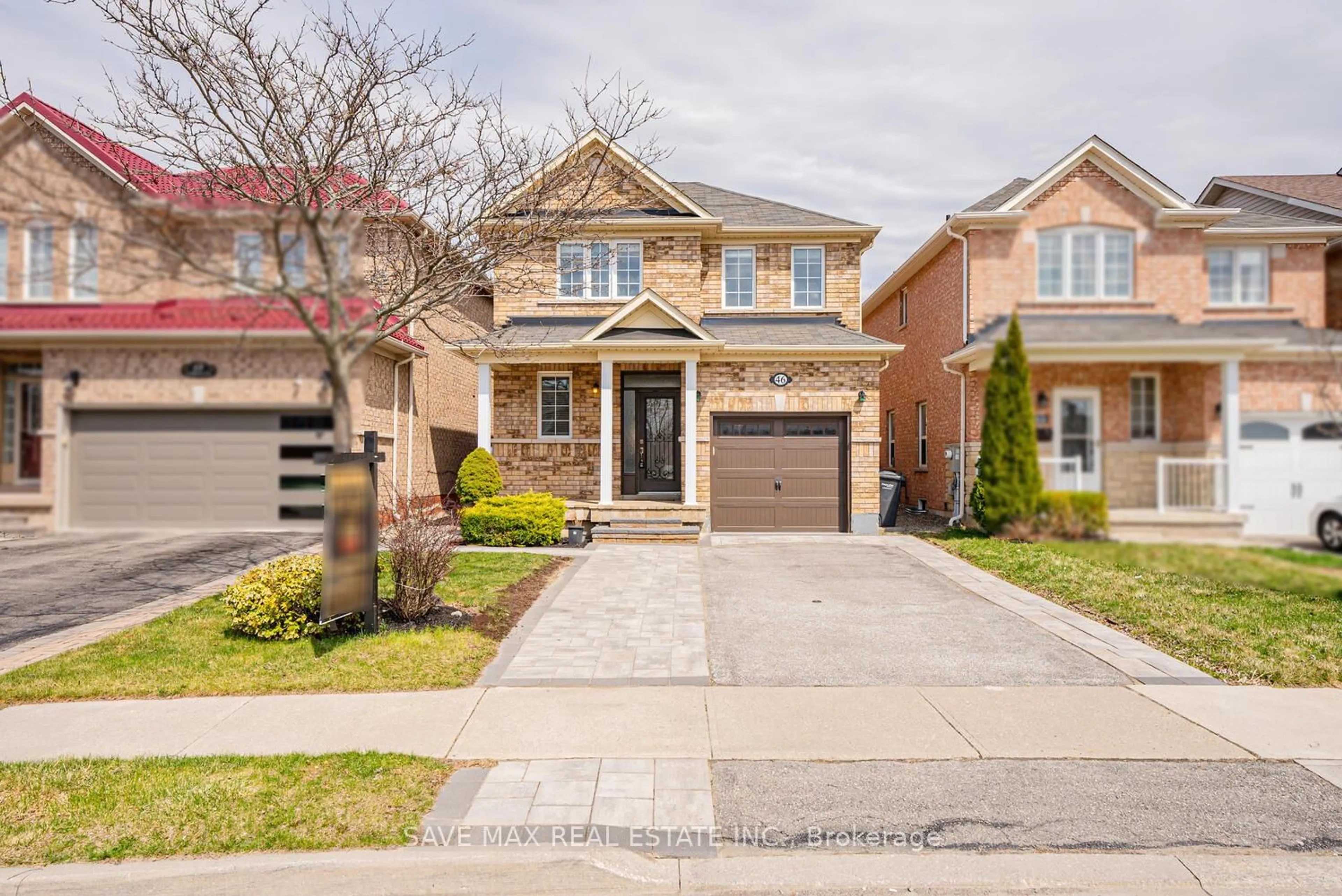 Home with brick exterior material, street for 46 Lockburn Cres, Brampton Ontario L7A 3W8