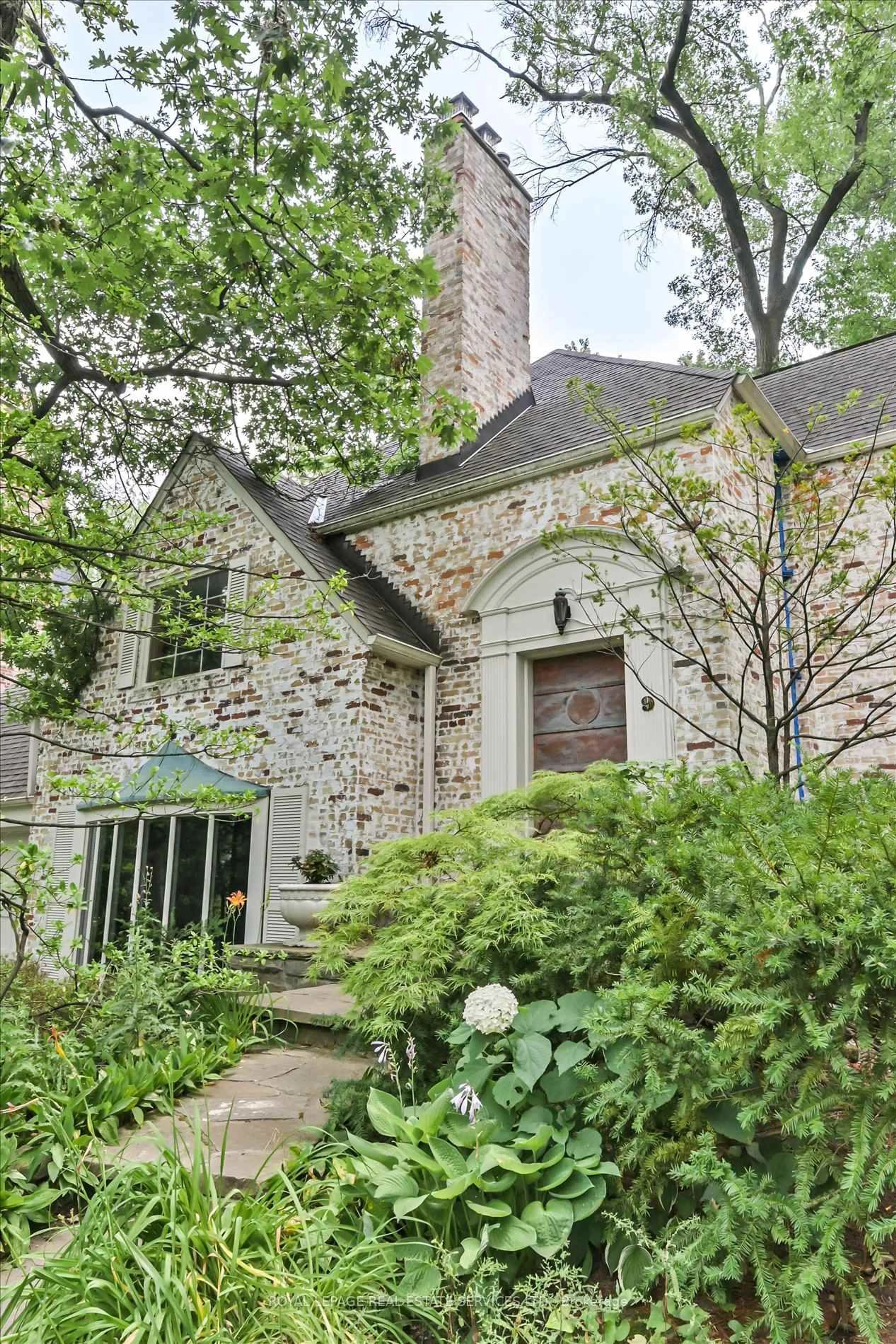 Home with brick exterior material, street for 9 Edenbridge-Humber Dr, Toronto Ontario M9A 3E8