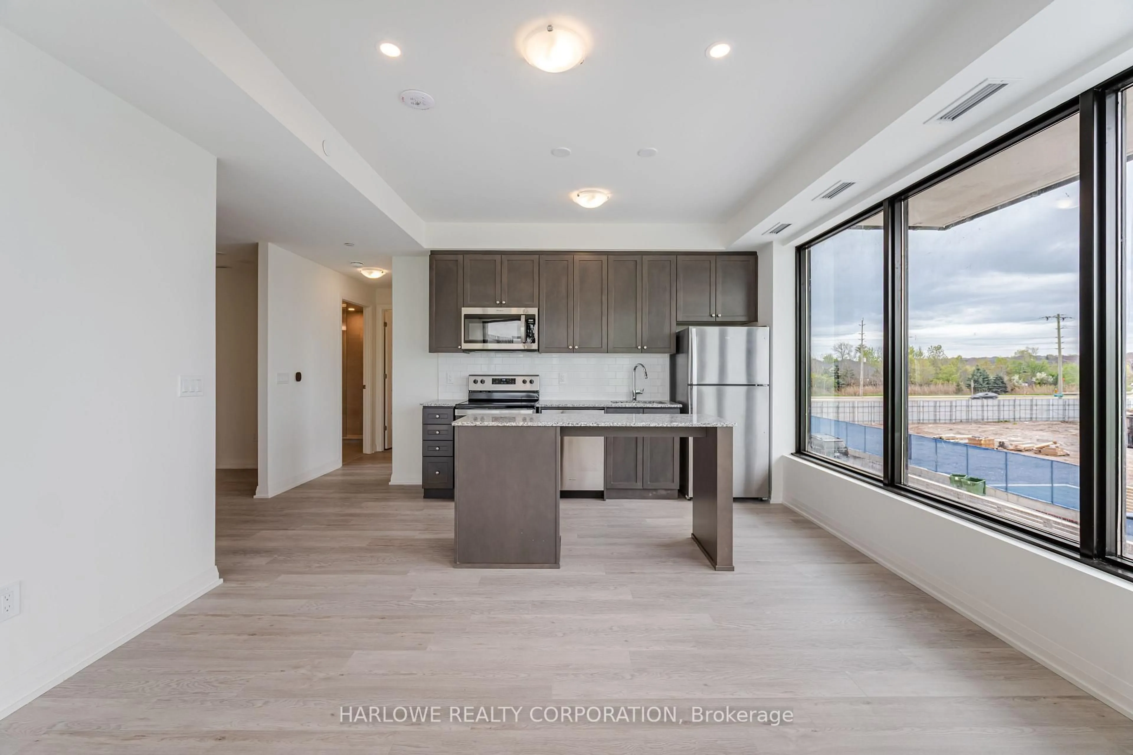 Open concept kitchen, unknown for 3006 William Cutmore Blvd #211, Oakville Ontario L6H 8A4