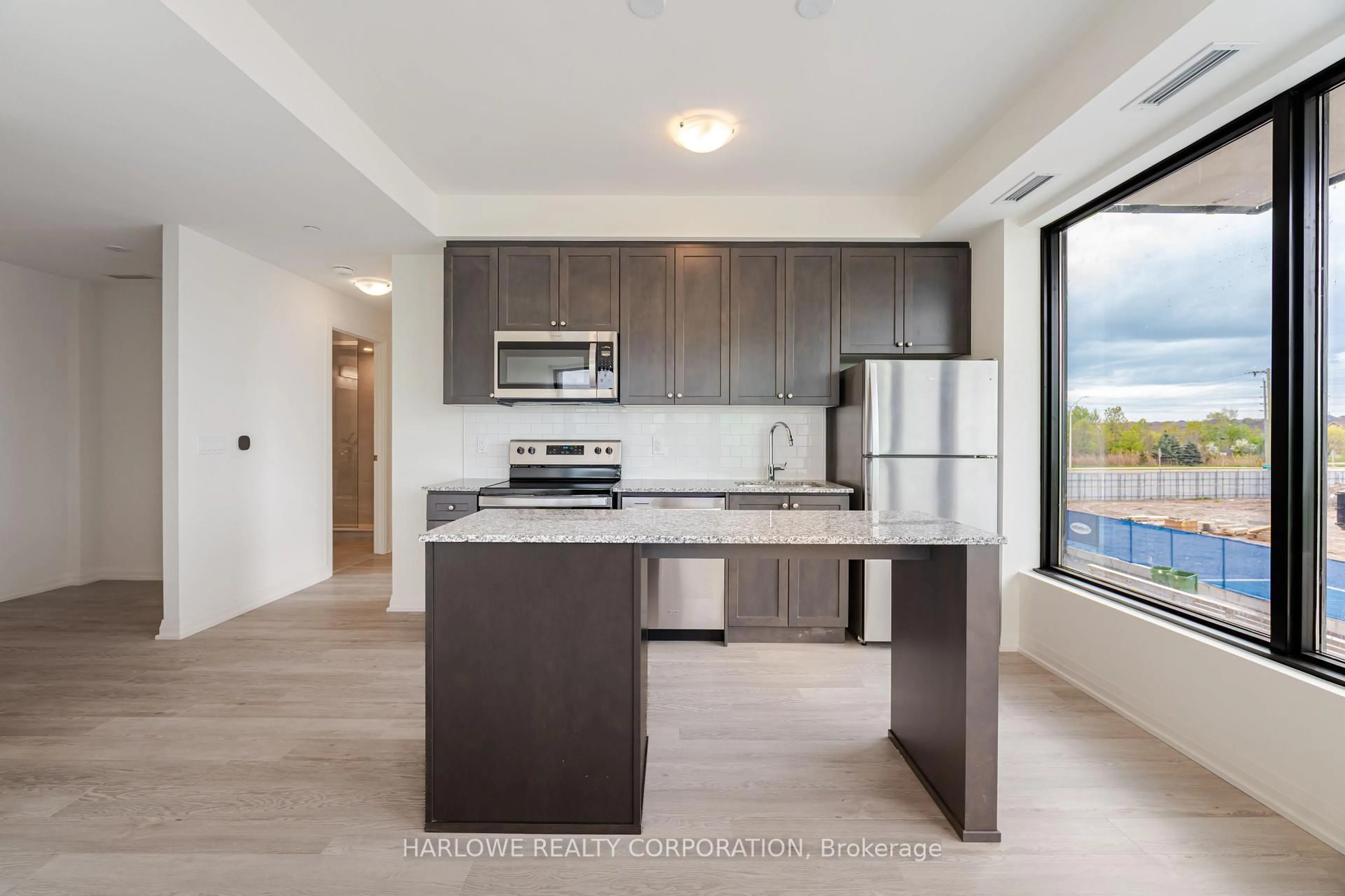 Open concept kitchen, unknown for 3006 William Cutmore Blvd #211, Oakville Ontario L6H 8A4