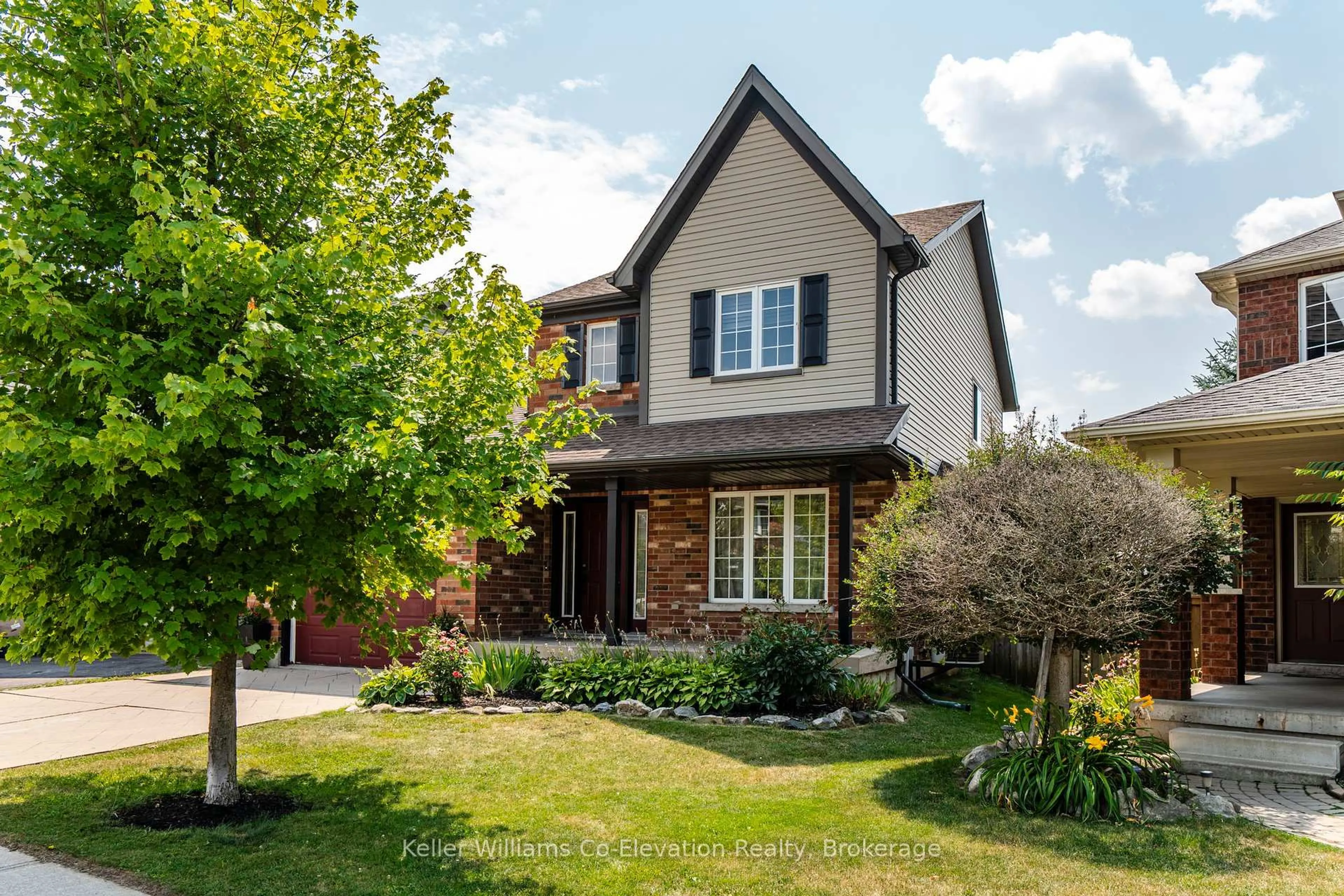 Home with brick exterior material, street for 14 Graham Cres, Orangeville Ontario L9W 5J4