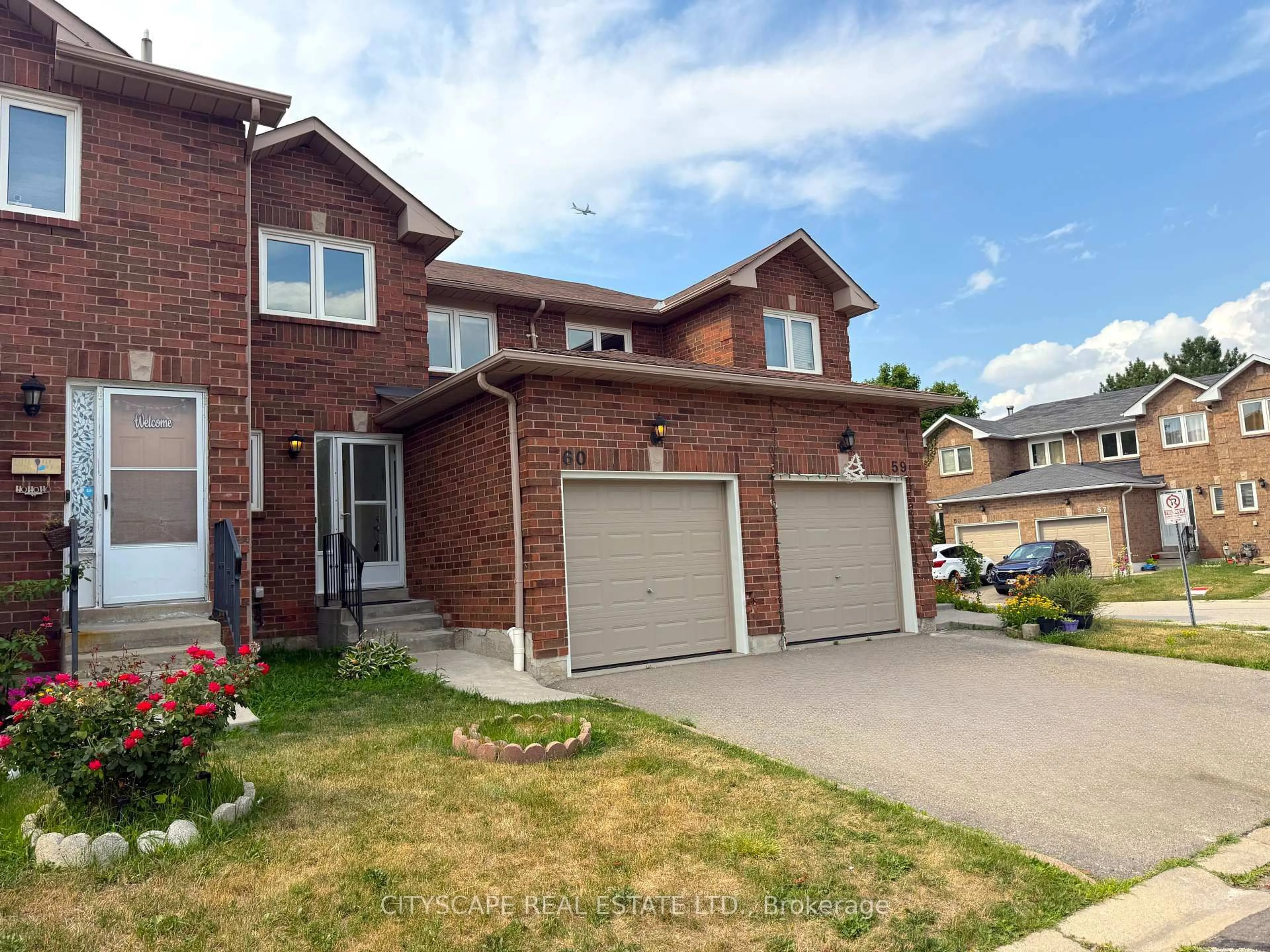 Home with brick exterior material, street for 1484 Torrington Dr #60, Mississauga Ontario L5V 1Y2