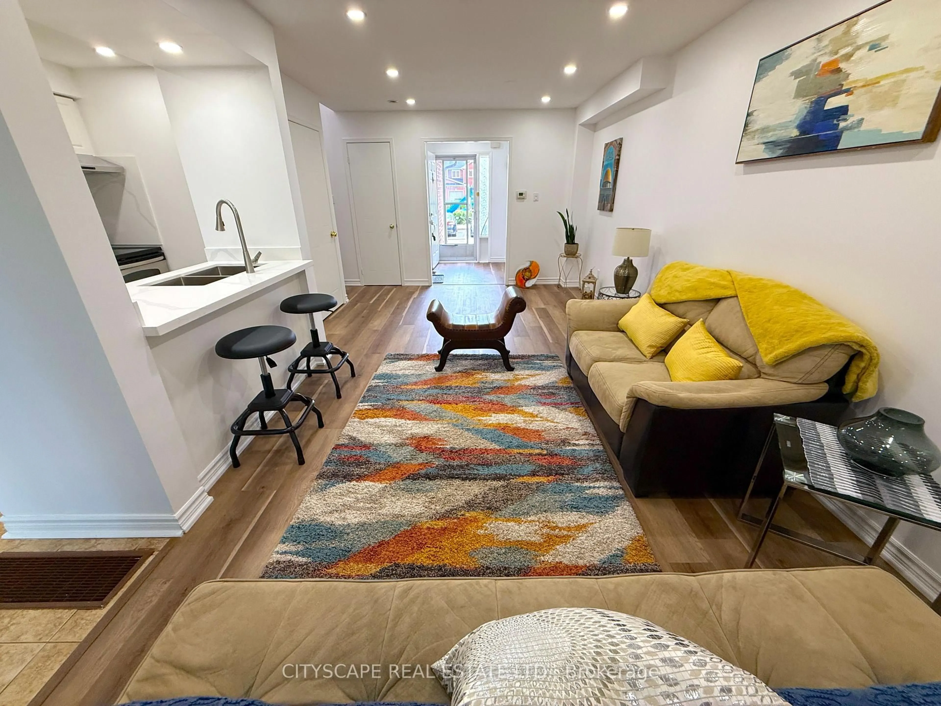 Living room with furniture, unknown for 1484 Torrington Dr #60, Mississauga Ontario L5V 1Y2