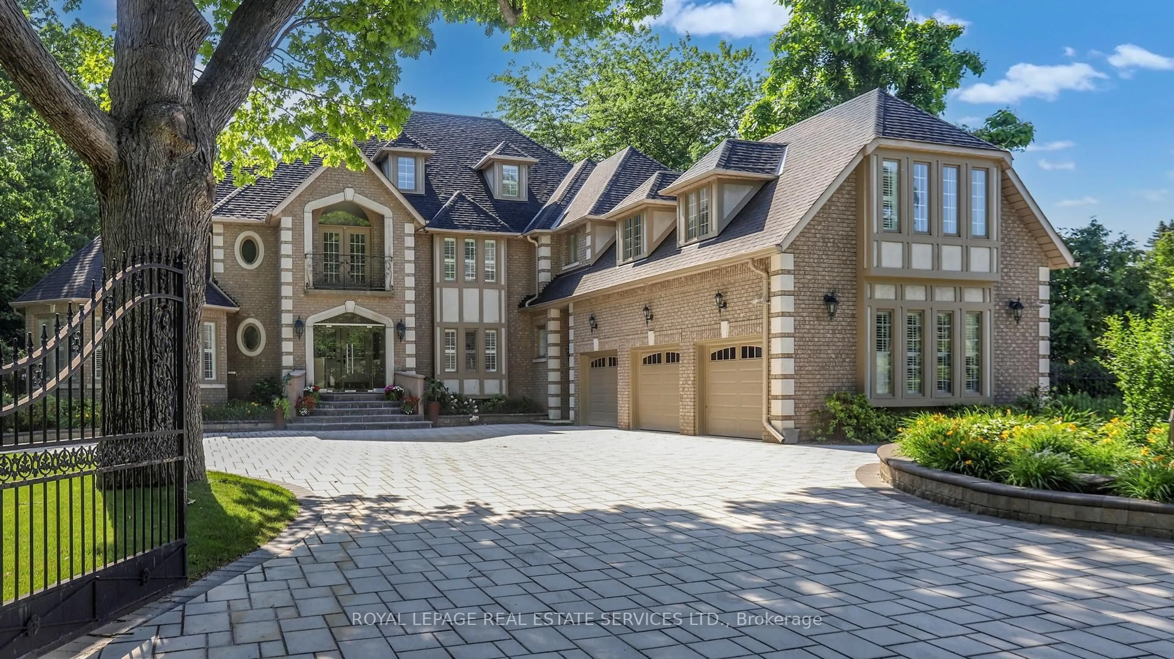 Home with brick exterior material, street for 2416 Mississauga Rd, Mississauga Ontario L5H 2L1