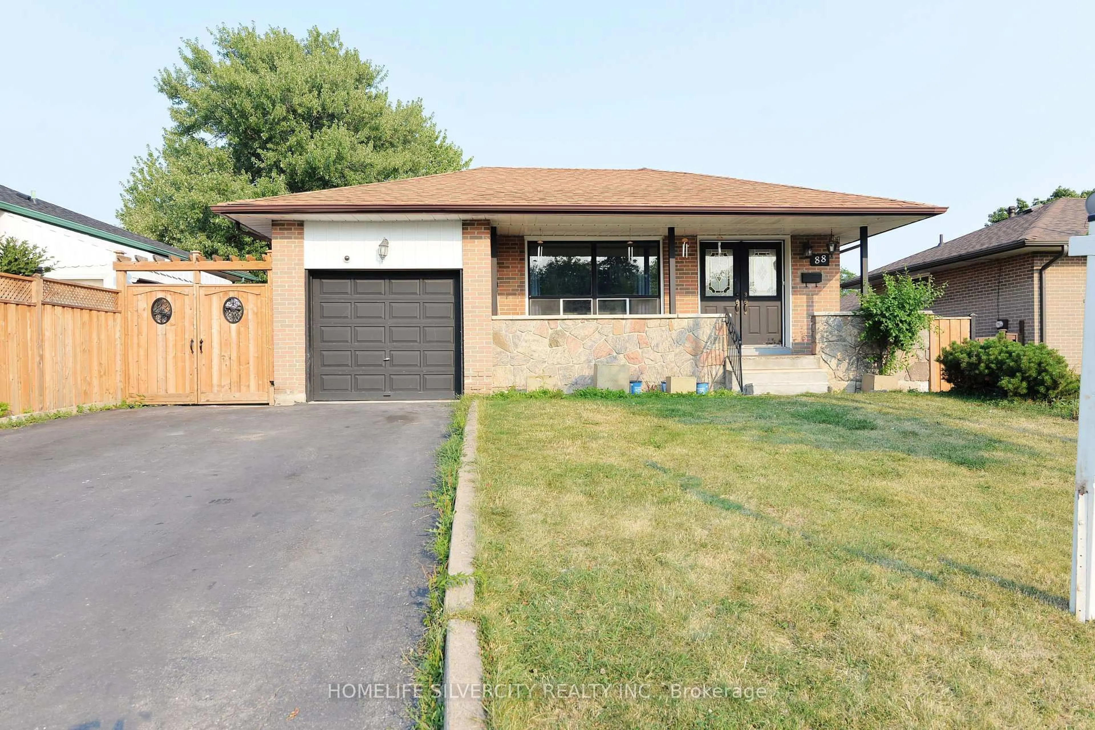 Home with brick exterior material, street for 88 Ardglen Dr, Brampton Ontario L6W 1V6