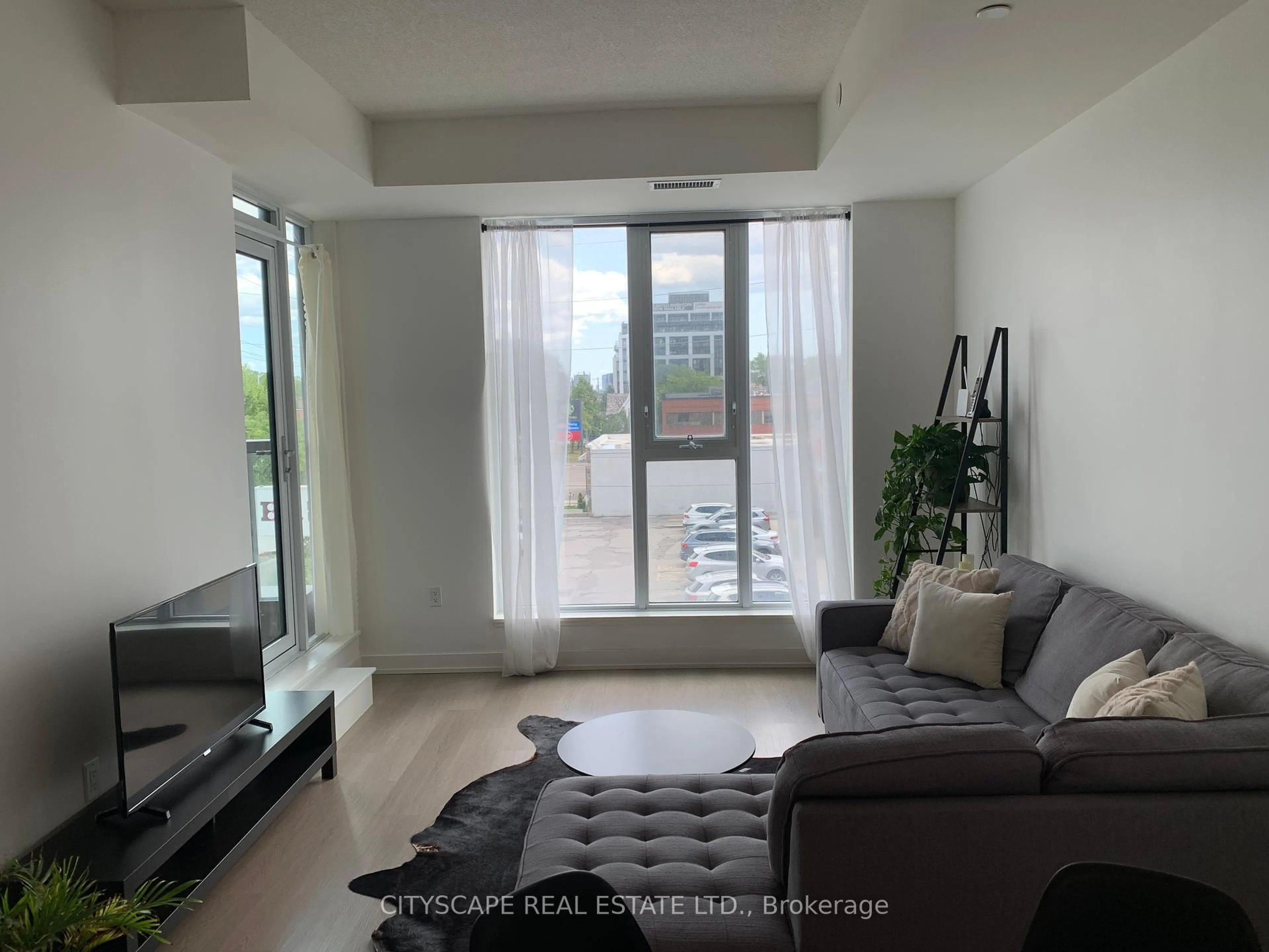 Living room with furniture, unknown for 859 The Queensway #219, Toronto Ontario M8Z 1N8