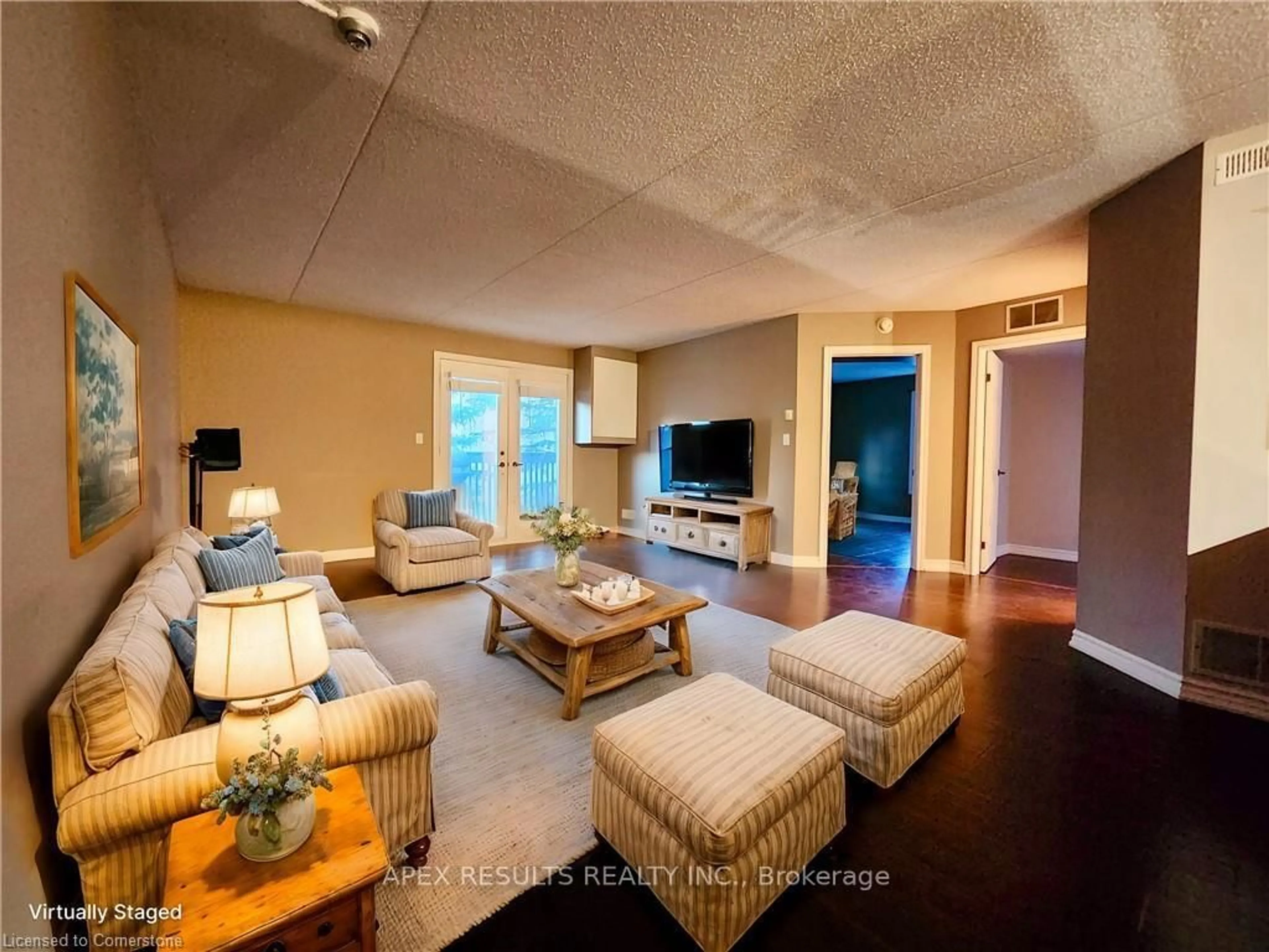 Living room with furniture, wood/laminate floor for 2020 Cleaver Ave #212, Burlington Ontario L7M 4C2