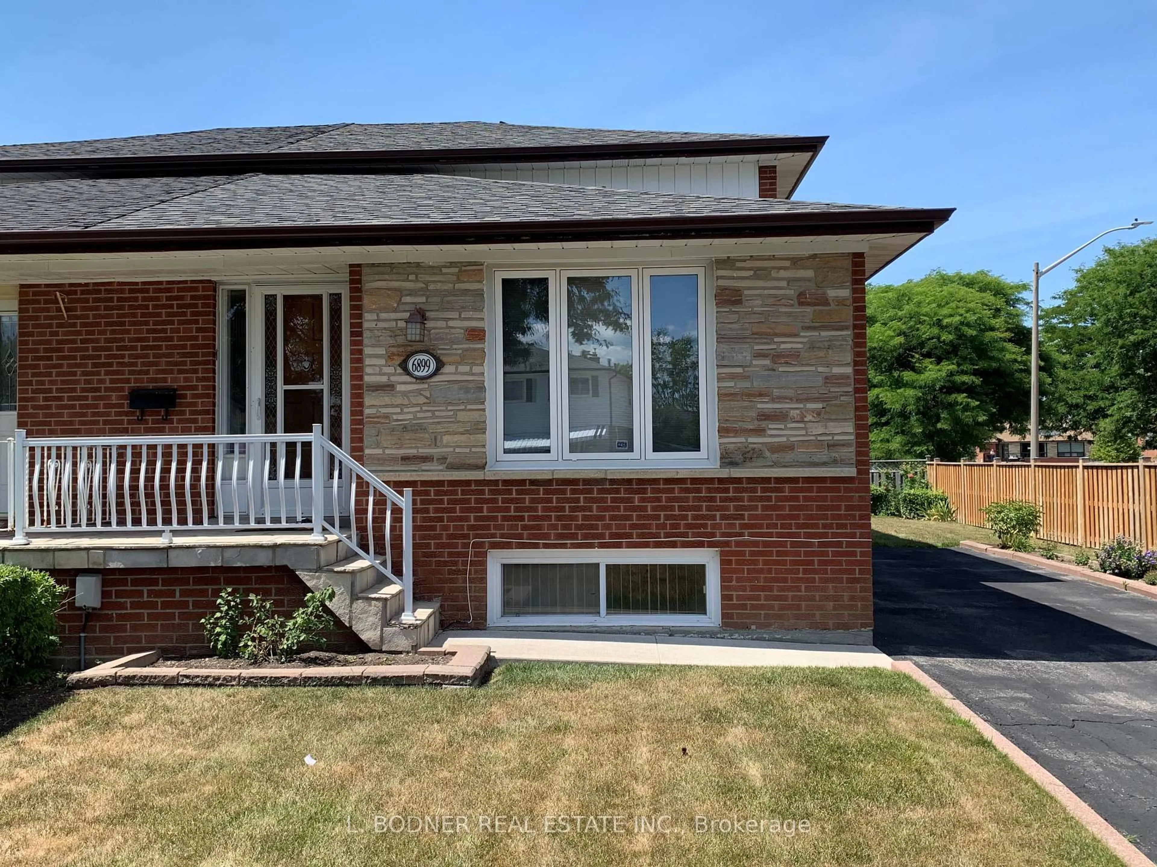 Home with brick exterior material, street for 6899 Darcel Ave, Mississauga Ontario L4T 2W7