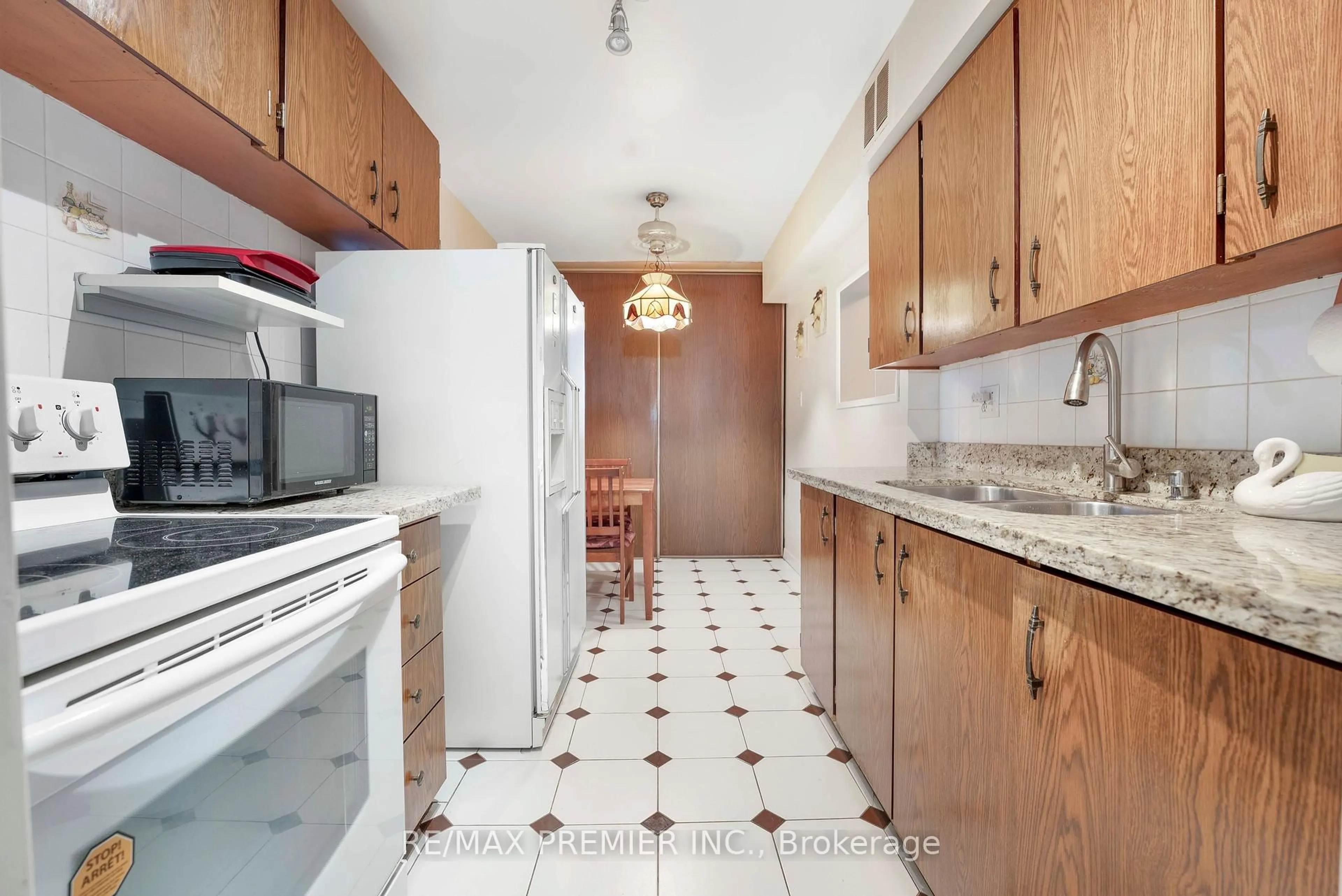 Standard kitchen, ceramic/tile floor for 370 Dixon Rd #406, Toronto Ontario M9R 1T2