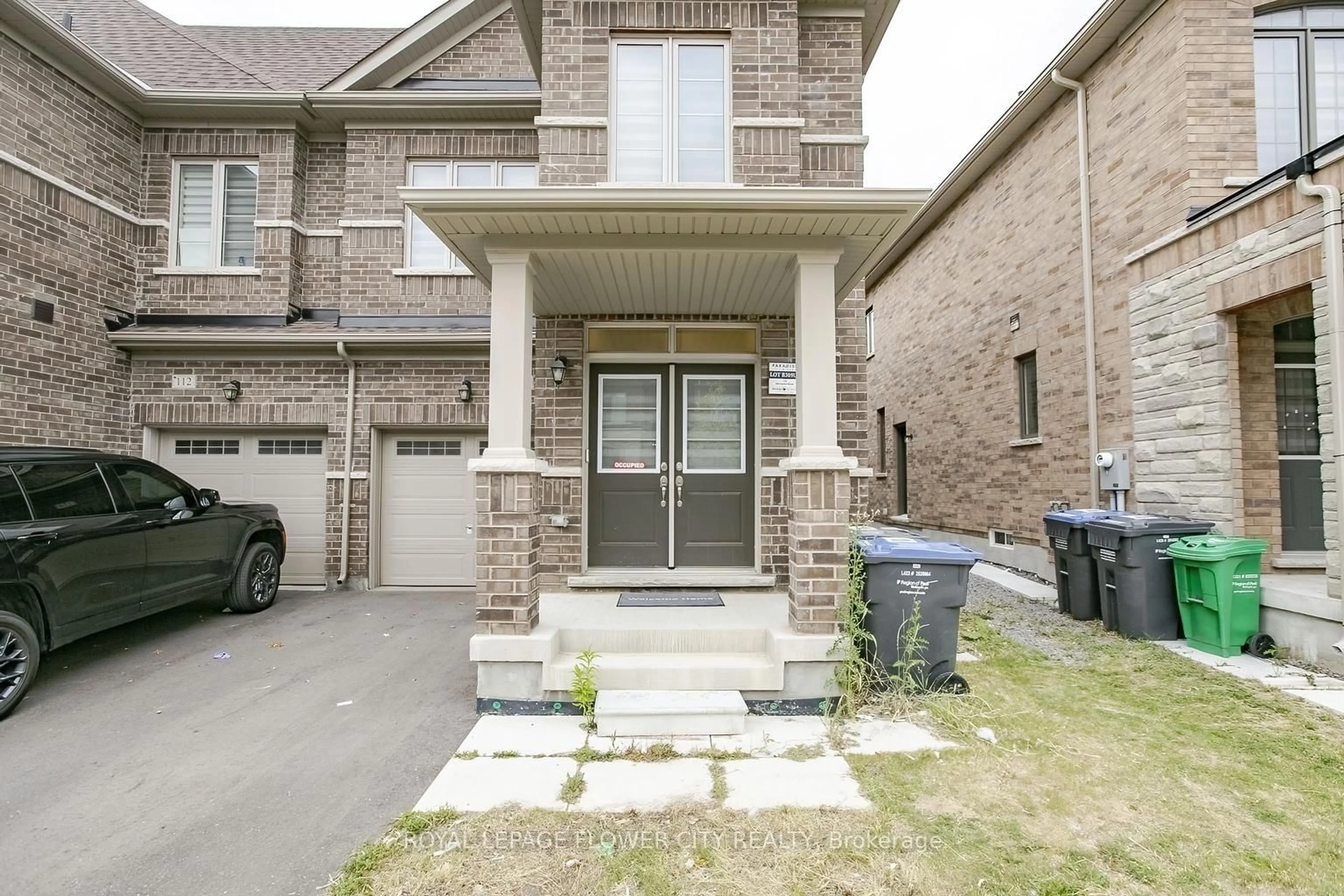 Home with brick exterior material, street for 114 Adventura Rd, Brampton Ontario L7A 5A7