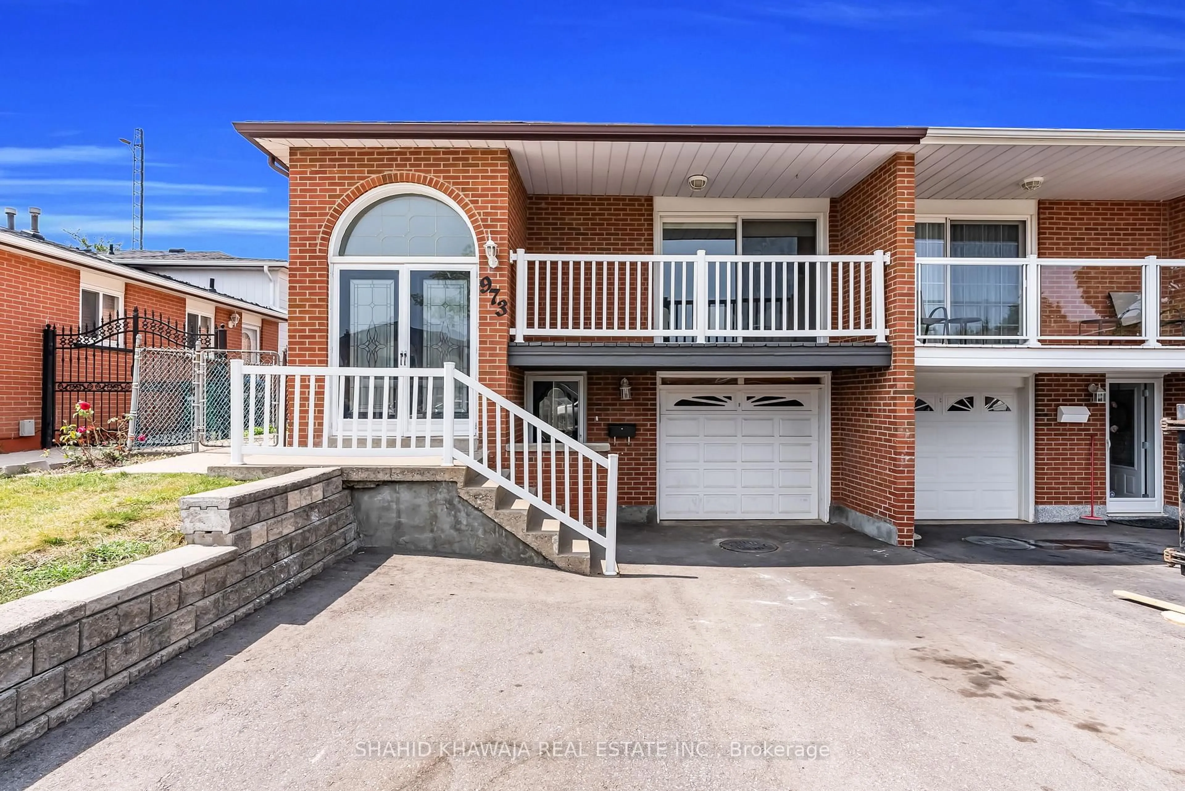 Home with brick exterior material, street for 973 Stainton Dr, Mississauga Ontario L5C 1G2