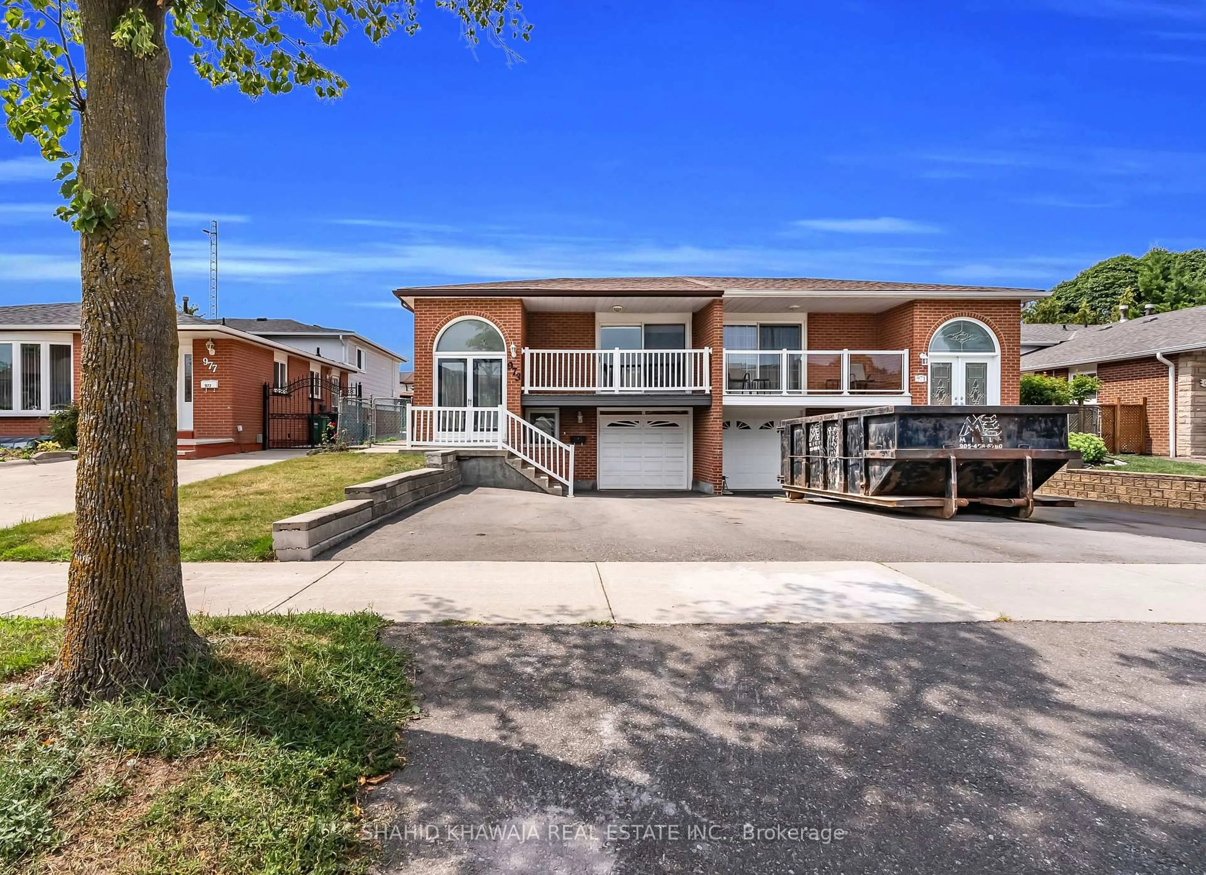 Home with brick exterior material, street for 973 Stainton Dr, Mississauga Ontario L5C 1G2