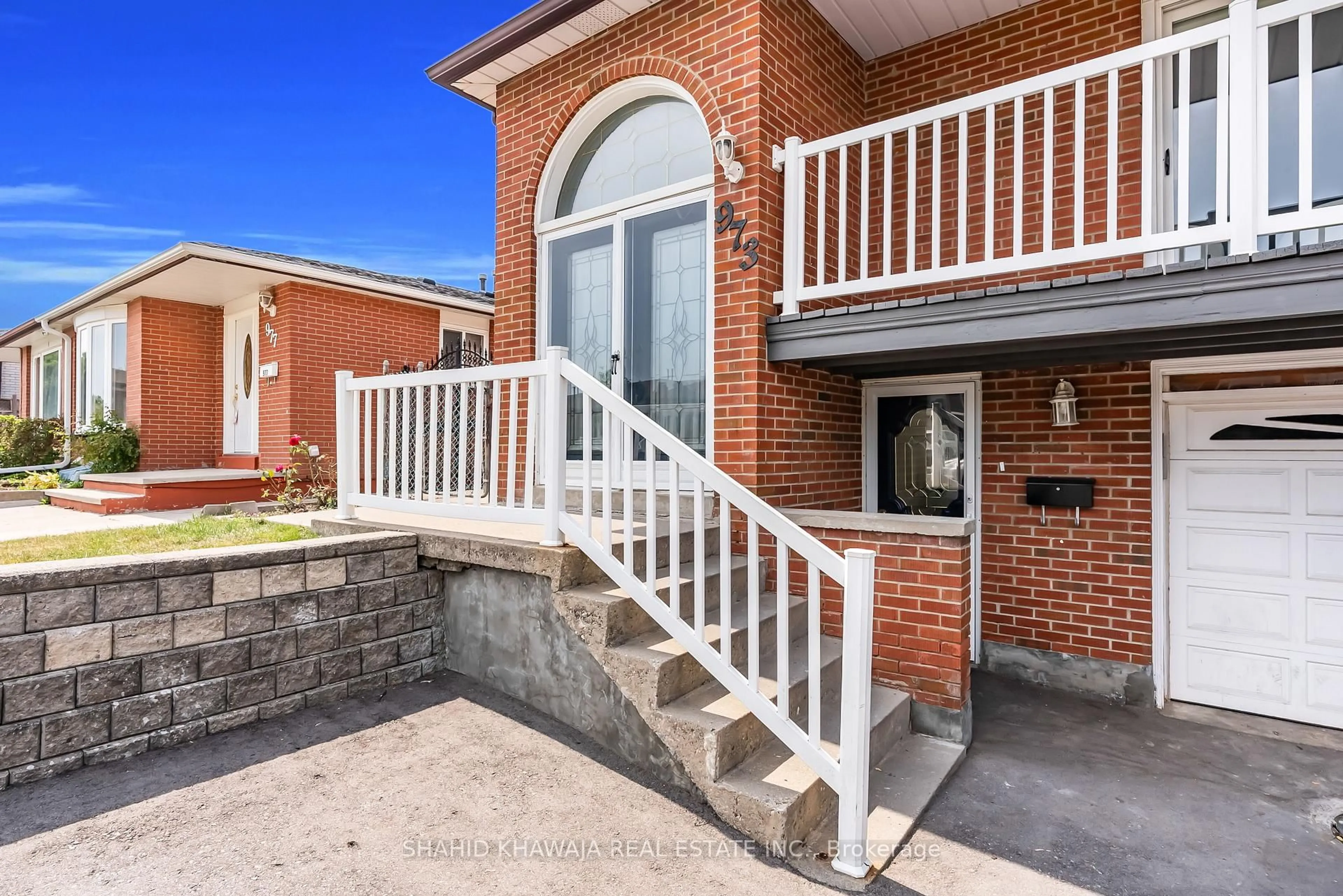 Home with brick exterior material, street for 973 Stainton Dr, Mississauga Ontario L5C 1G2