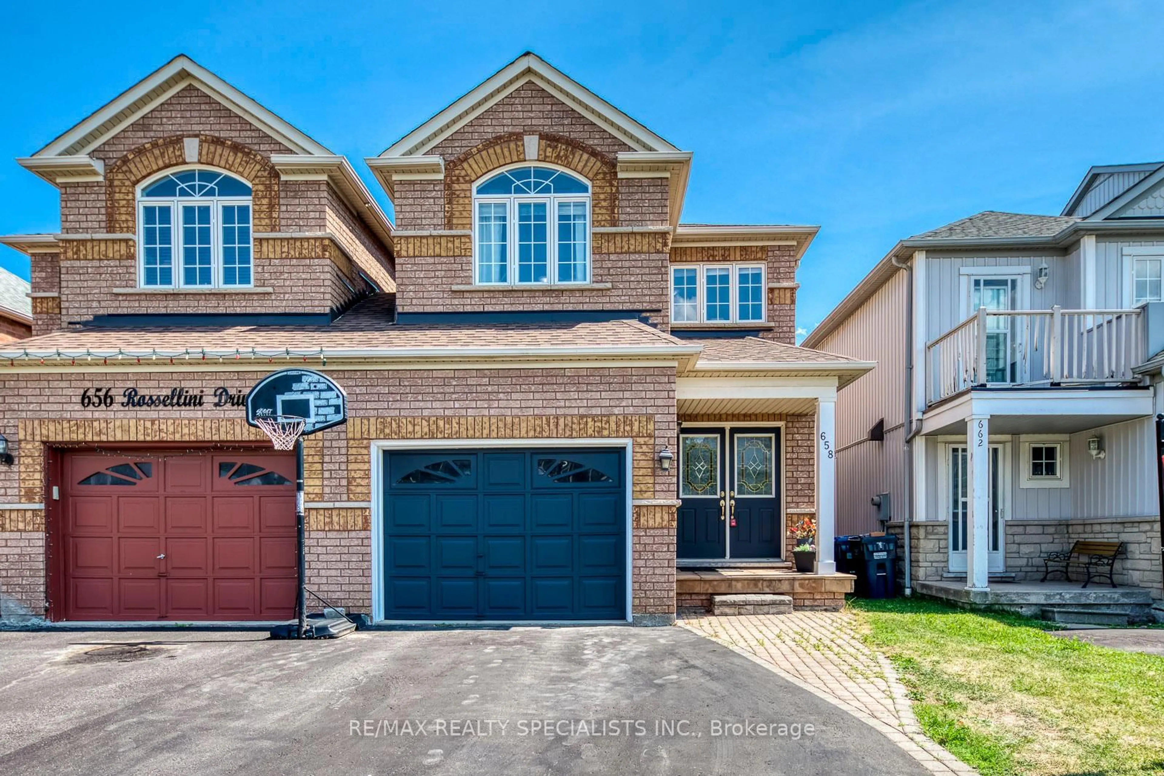 Home with brick exterior material, street for 658 Rossellini Dr, Mississauga Ontario L5W 1K9
