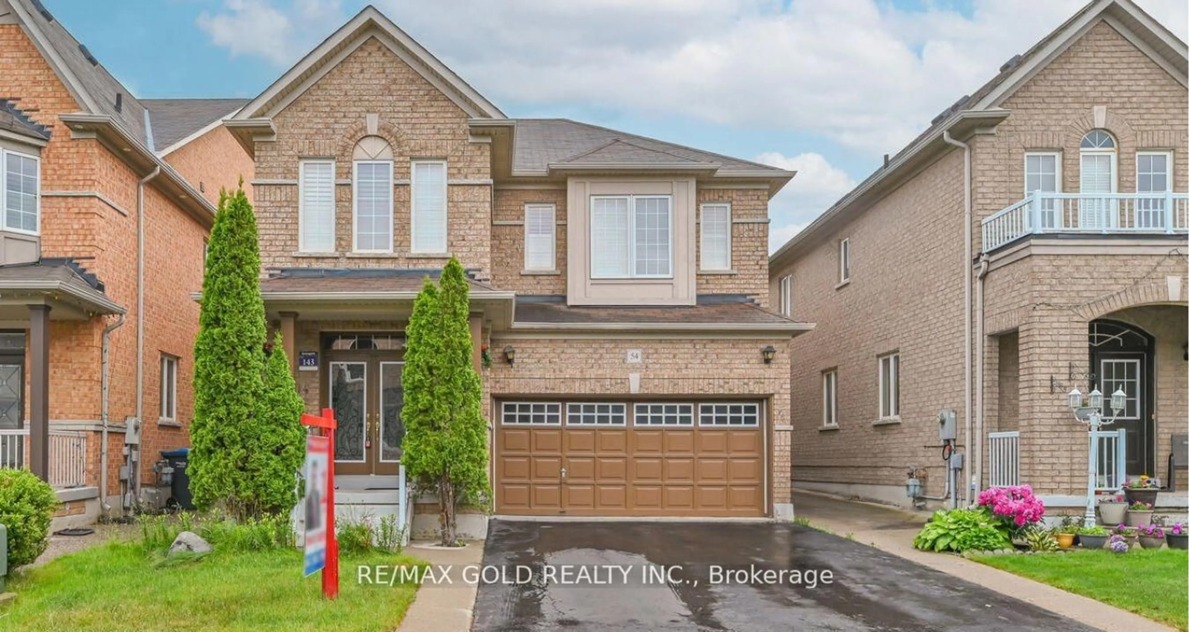 Home with brick exterior material, street for 54 Gamson Cres, Brampton Ontario L6R 0V6