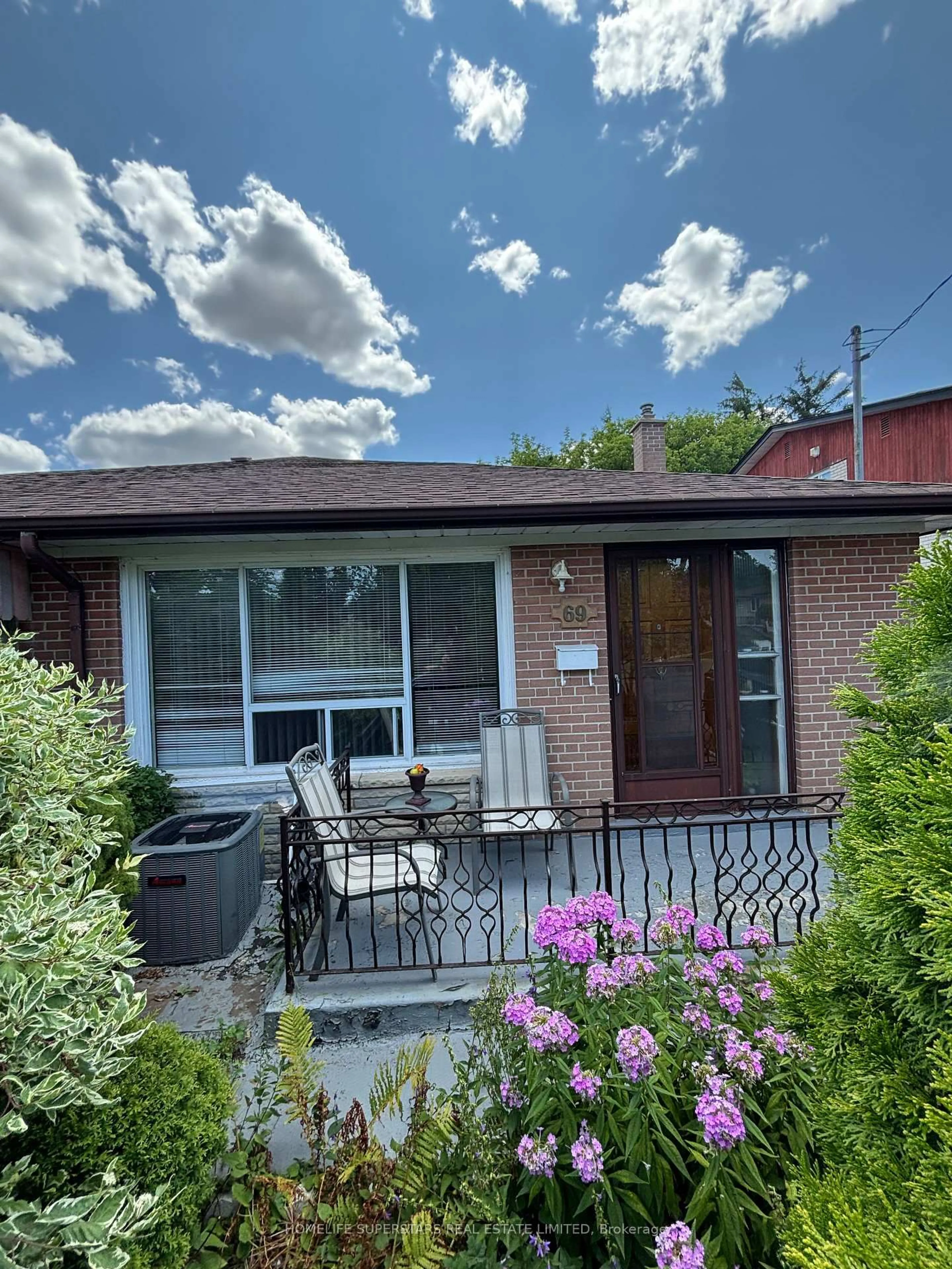 Home with brick exterior material, street for 69 Thistle Down Blvd, Toronto Ontario M9V 1J1