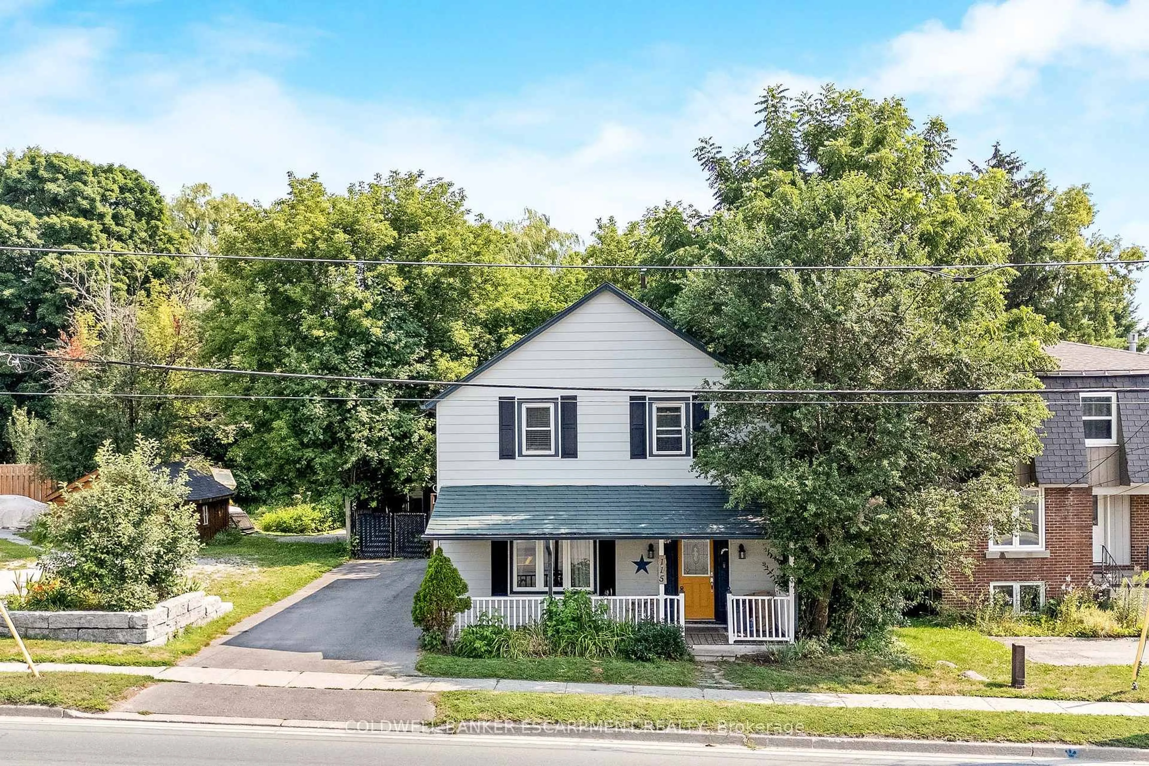 A pic from outside/outdoor area/front of a property/back of a property/a pic from drone, street for 115 Main St, Halton Hills Ontario L7J 1W5