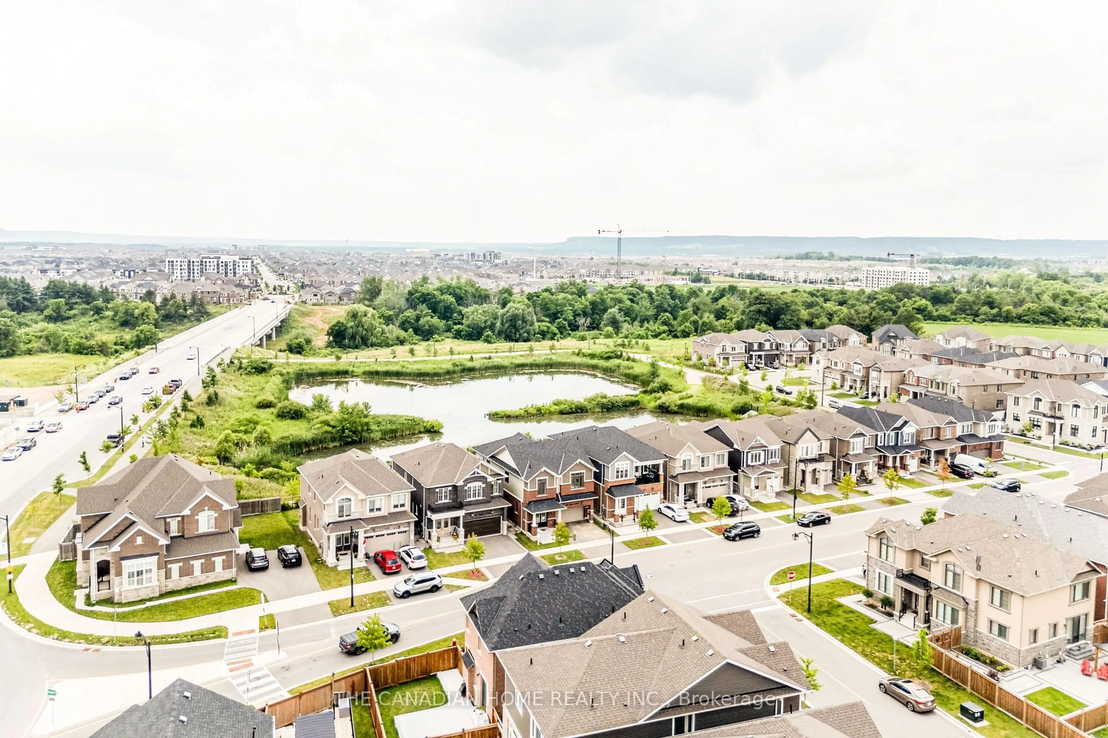 A pic from outside/outdoor area/front of a property/back of a property/a pic from drone, water/lake/river/ocean view for 115 Yates Dr, Milton Ontario L9T 2X5