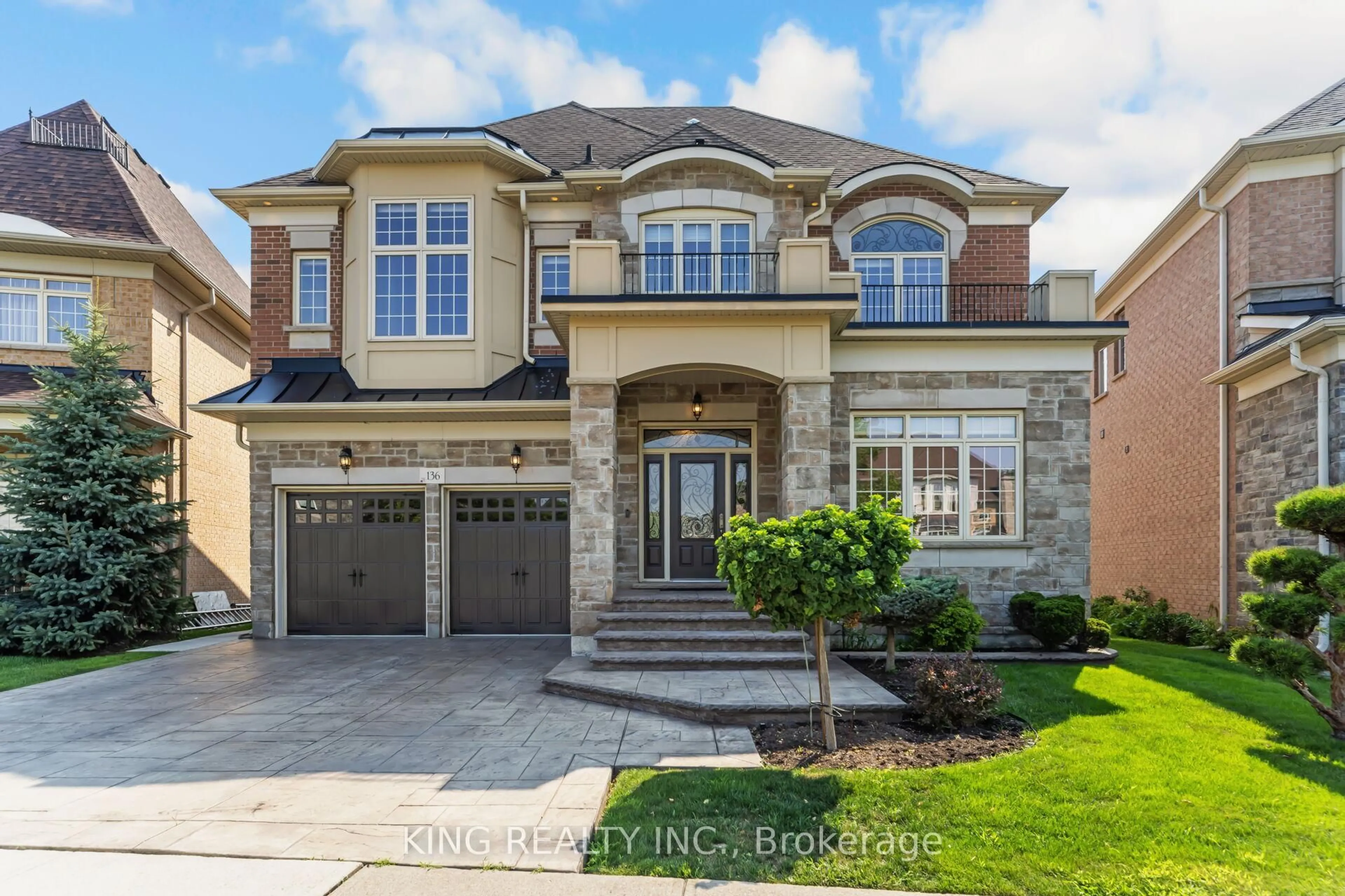 Home with brick exterior material, street for 136 Coastline Dr, Brampton Ontario L6Y 0S3