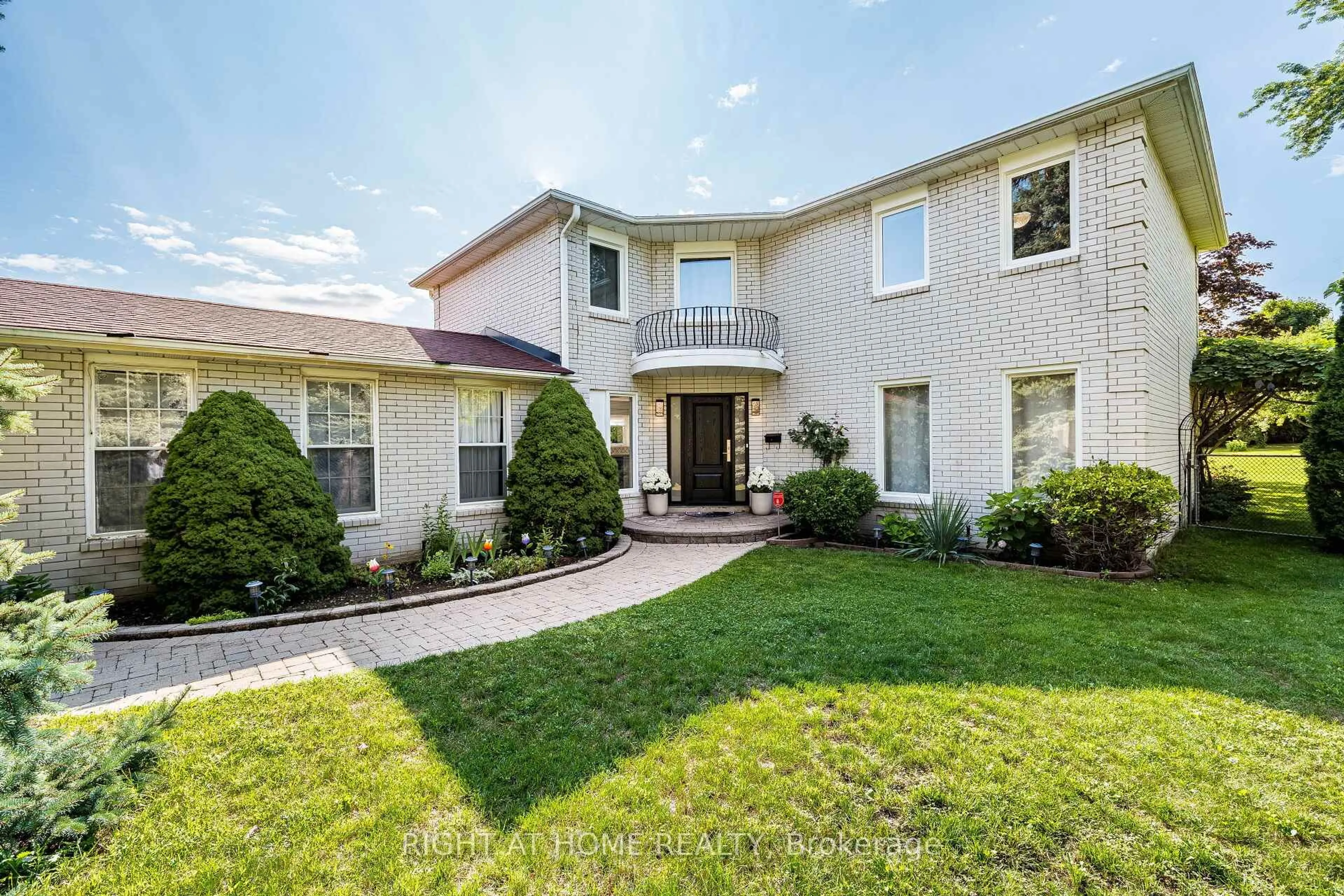 Home with brick exterior material, street for 3981 Mahogany Row, Mississauga Ontario L4W 2H7
