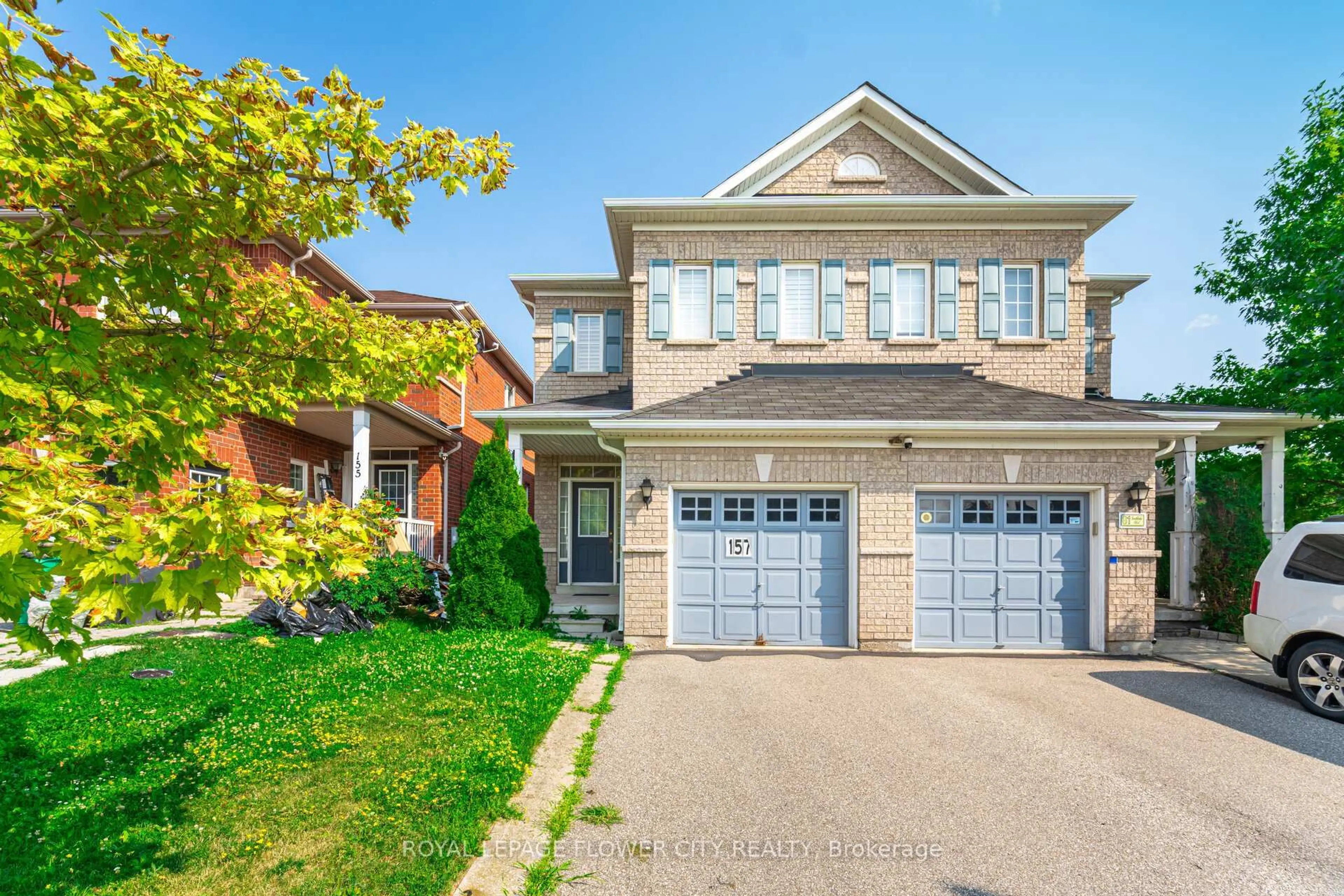 Home with brick exterior material, street for 157 Seahorse Ave, Brampton Ontario L6V 4N8