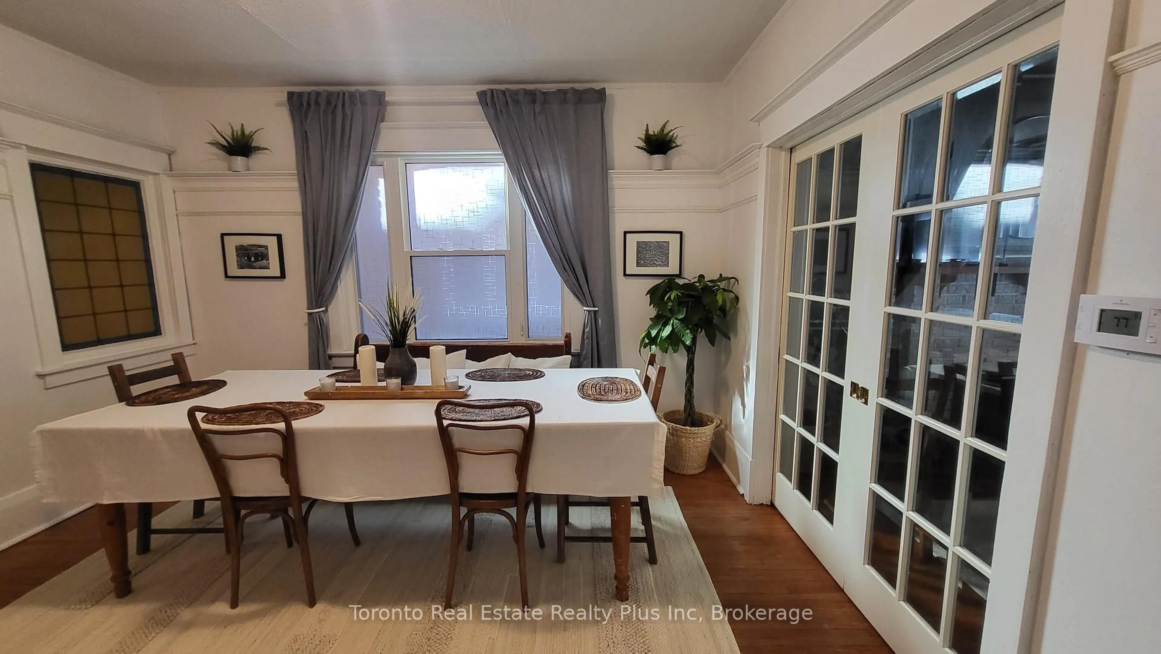 Dining room, wood/laminate floor for 133 Fairview Ave, Toronto Ontario M6P 3A6