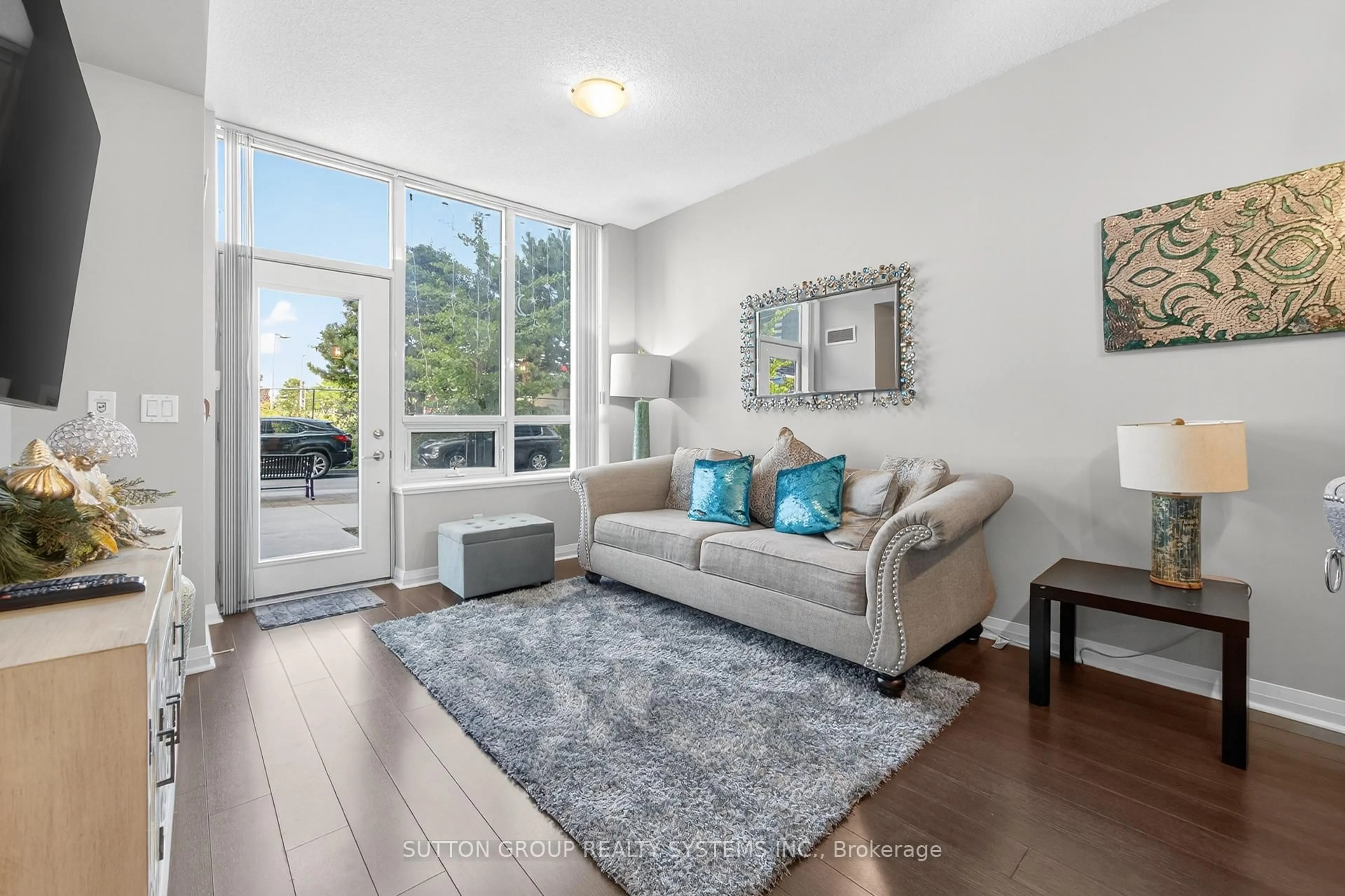Living room with furniture, unknown for 55 Eglinton Ave #104, Mississauga Ontario L5R 0E4