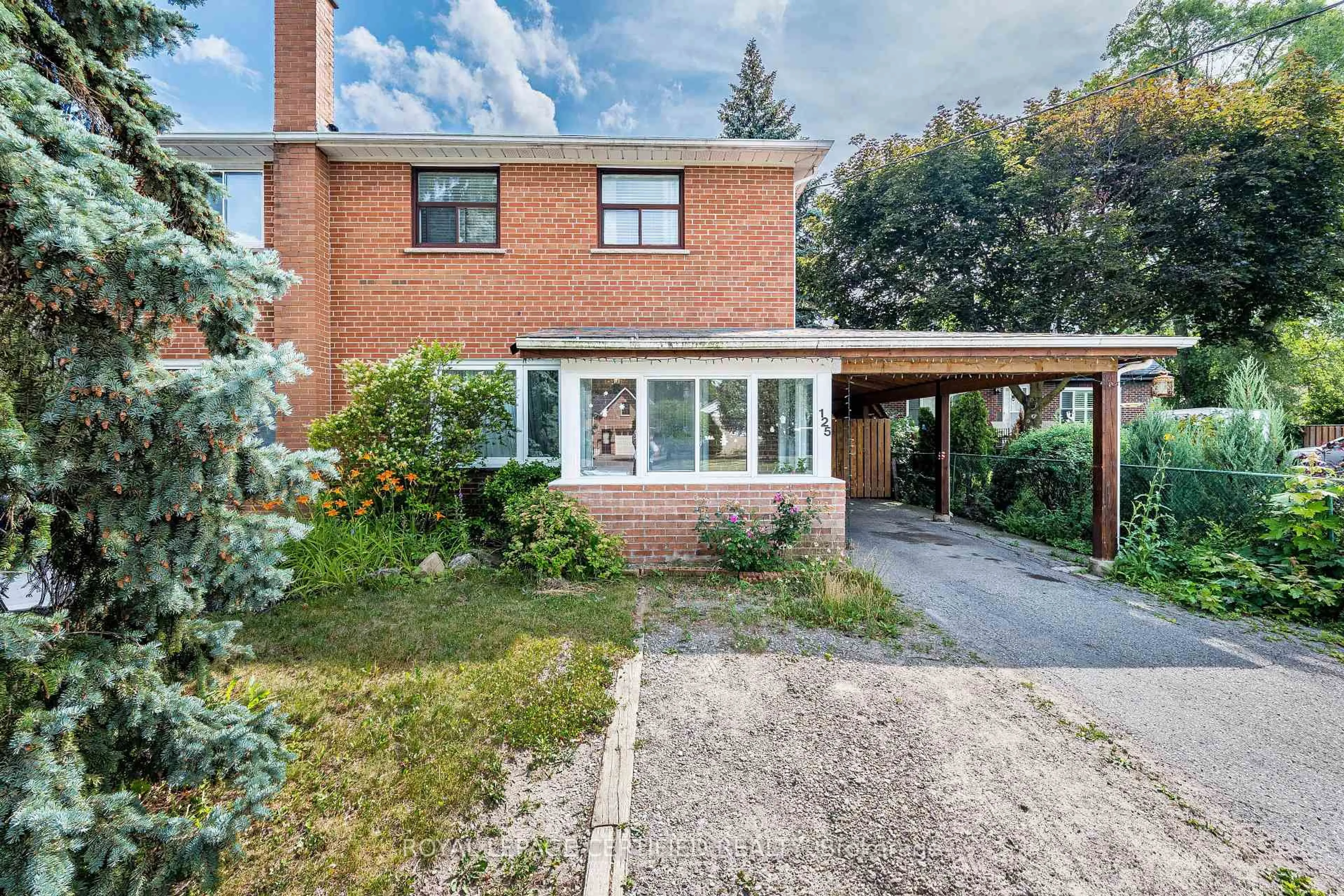 Home with brick exterior material, street for 125 Mcmurchy Ave, Brampton Ontario L6Y 1Z1