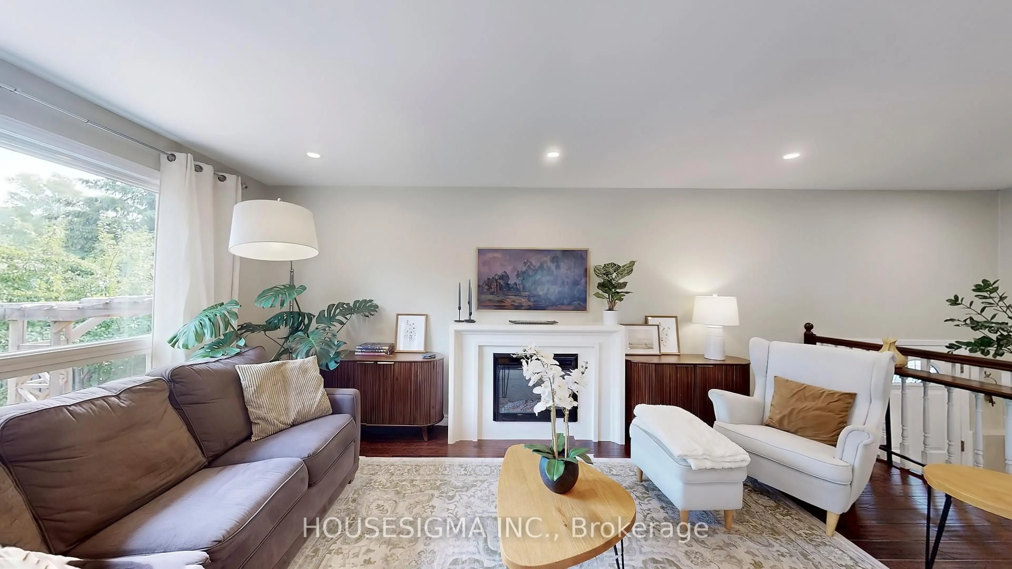 Living room with furniture, wood/laminate floor for 641 Glen Moor Cres, Burlington Ontario L7N 2Z8