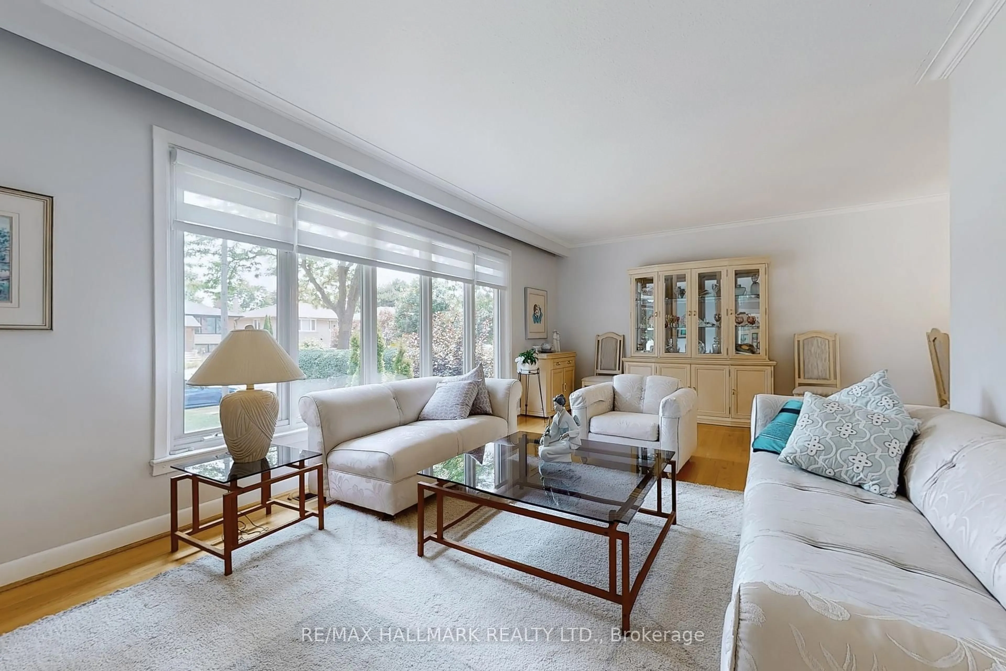 Living room with furniture, unknown for 69 Breadner Dr, Toronto Ontario M9R 3M5