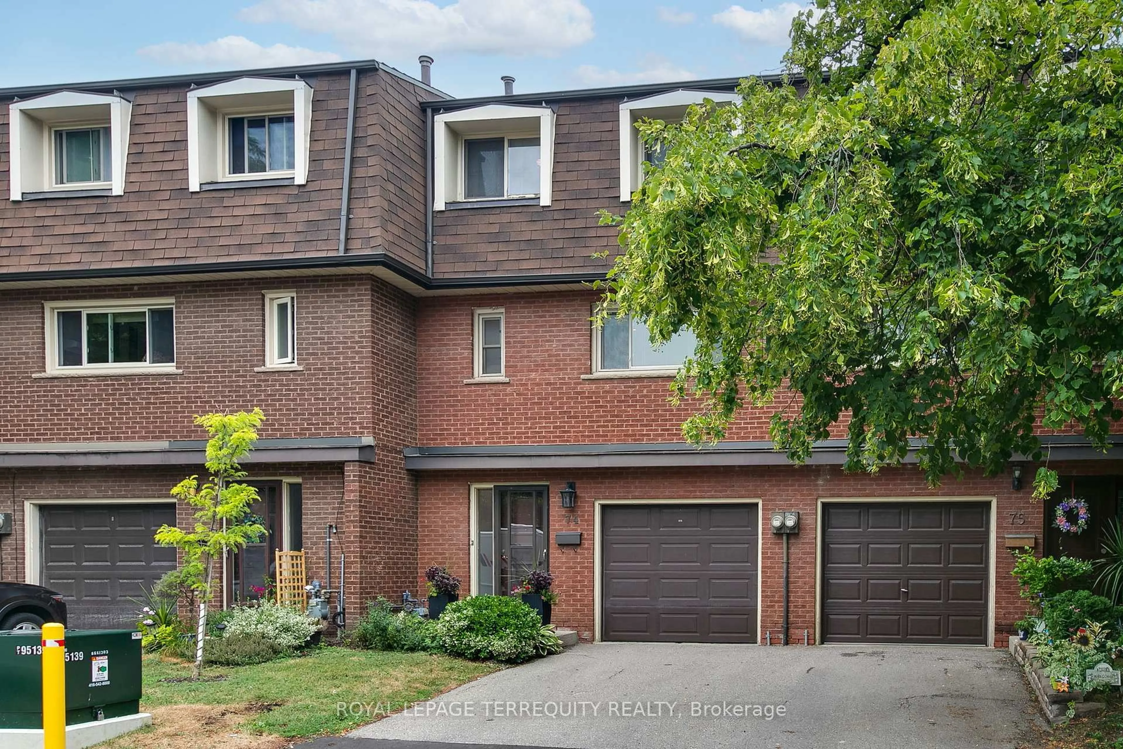 Home with brick exterior material, street for 74 Silver Shadow Path, Toronto Ontario M9C 4Y2