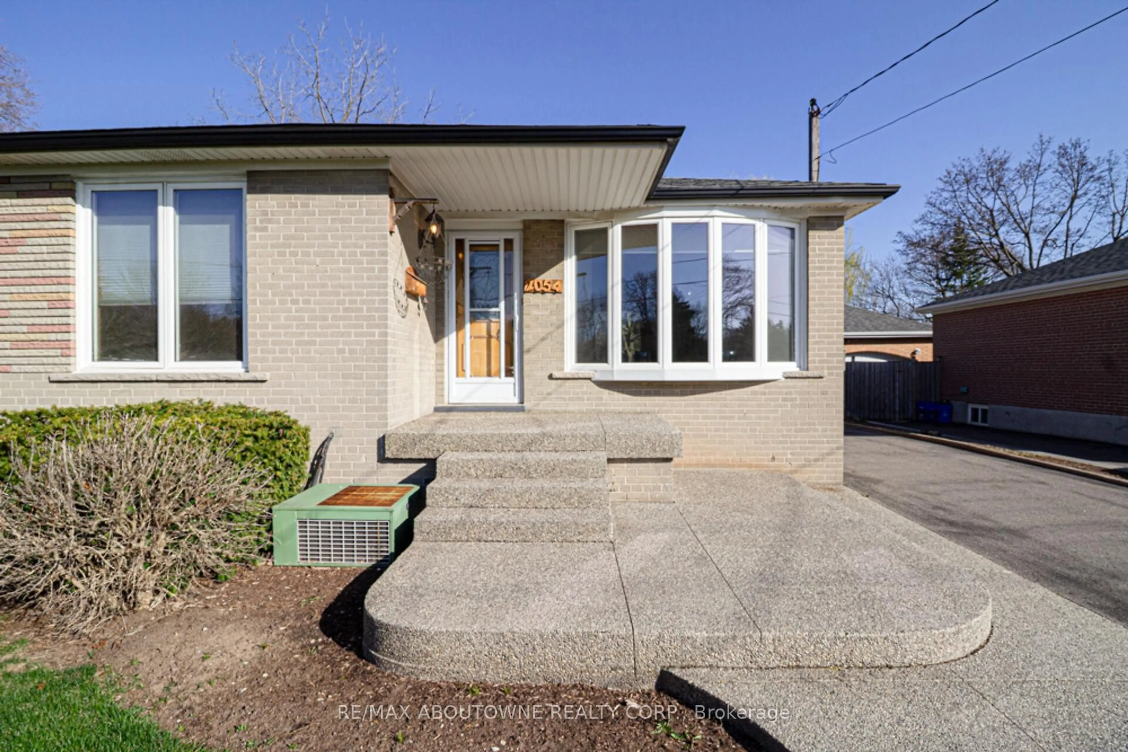 Home with brick exterior material, street for 2054 Bridge Rd, Oakville Ontario L6L 2E7