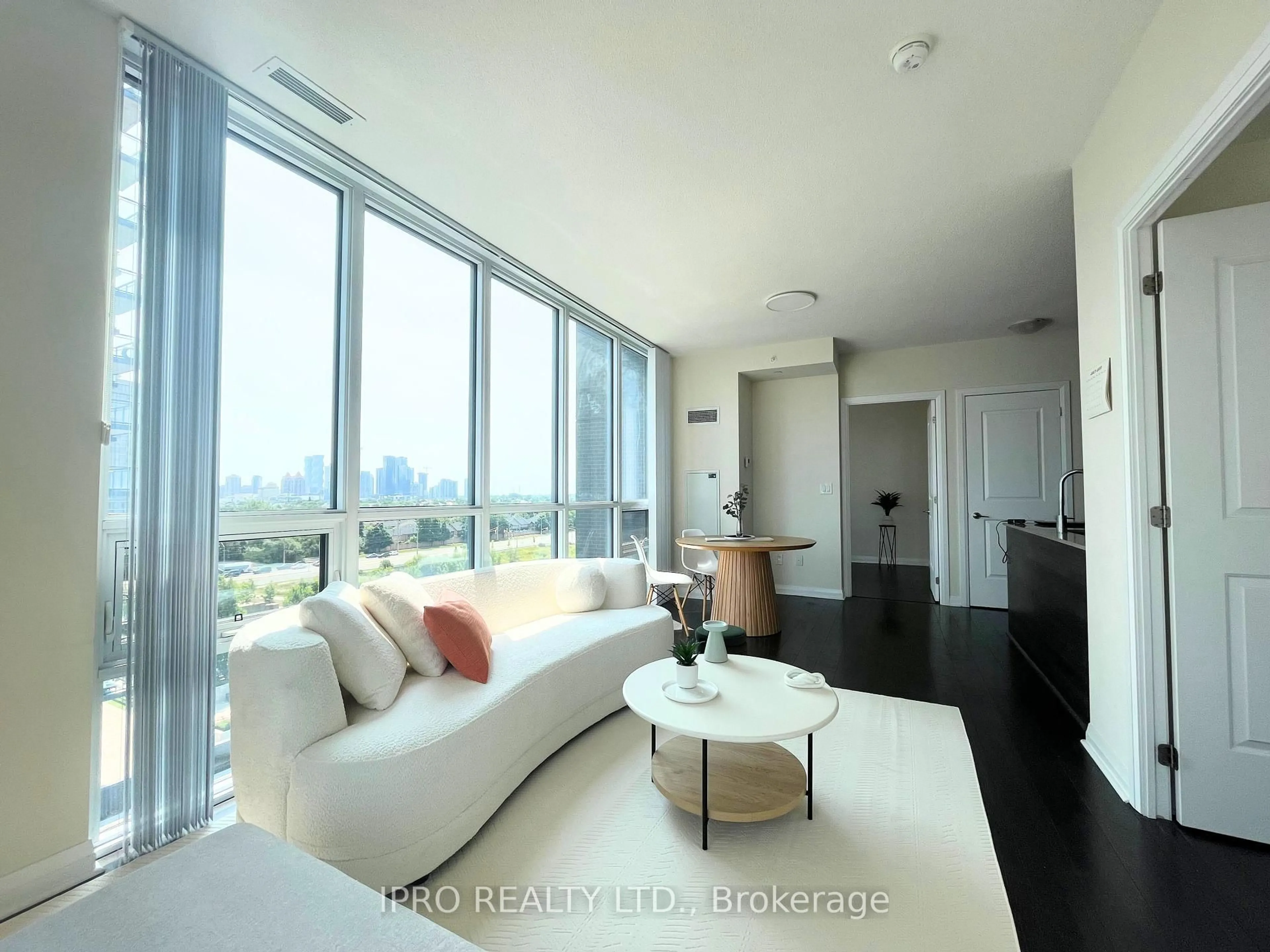 Living room with furniture, unknown for 5033 Four Springs Ave #719, Mississauga Ontario L5R 0G6