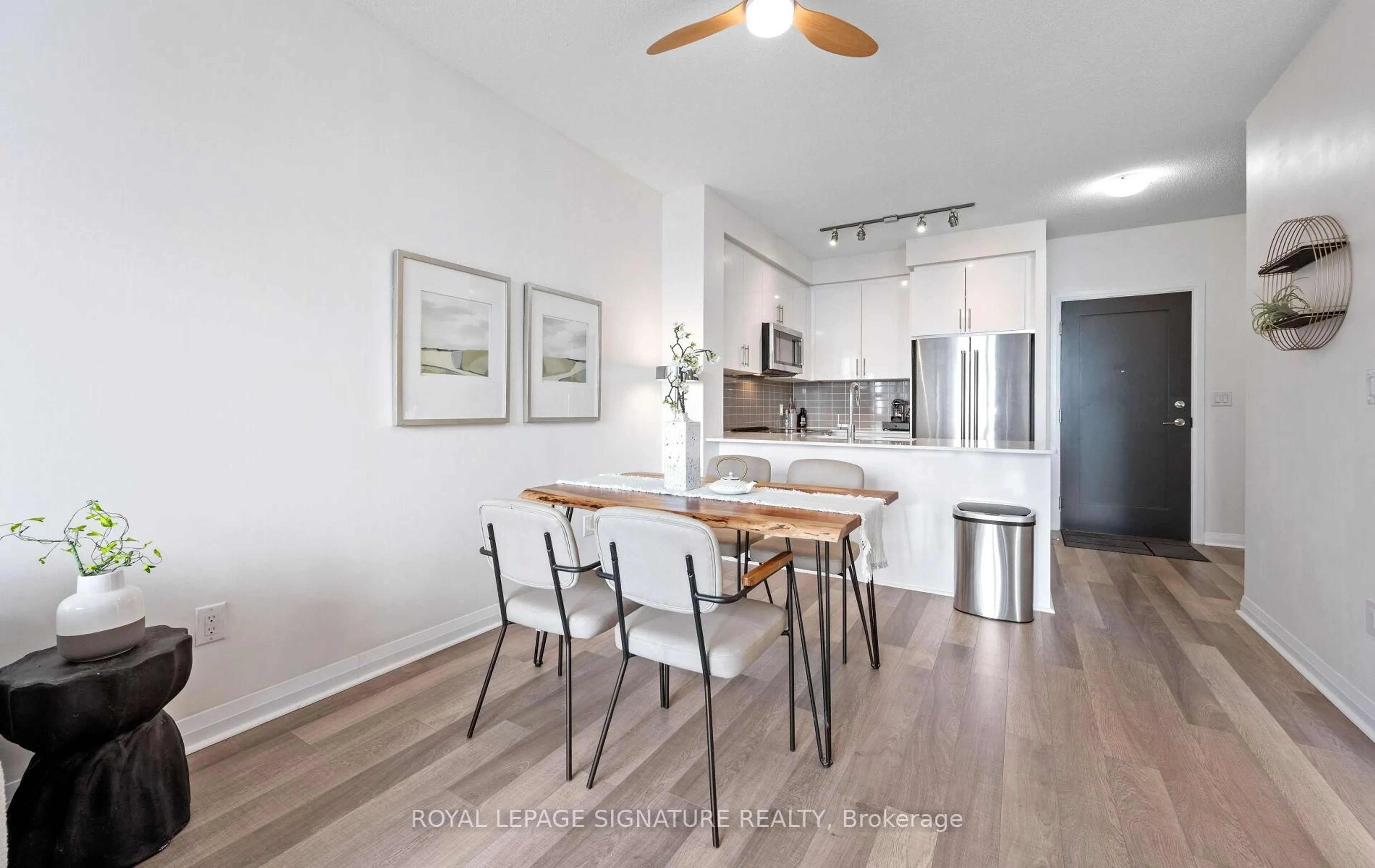 Open concept kitchen, wood/laminate floor for 5025 Four Springs Ave #2404, Mississauga Ontario L5R 0G5