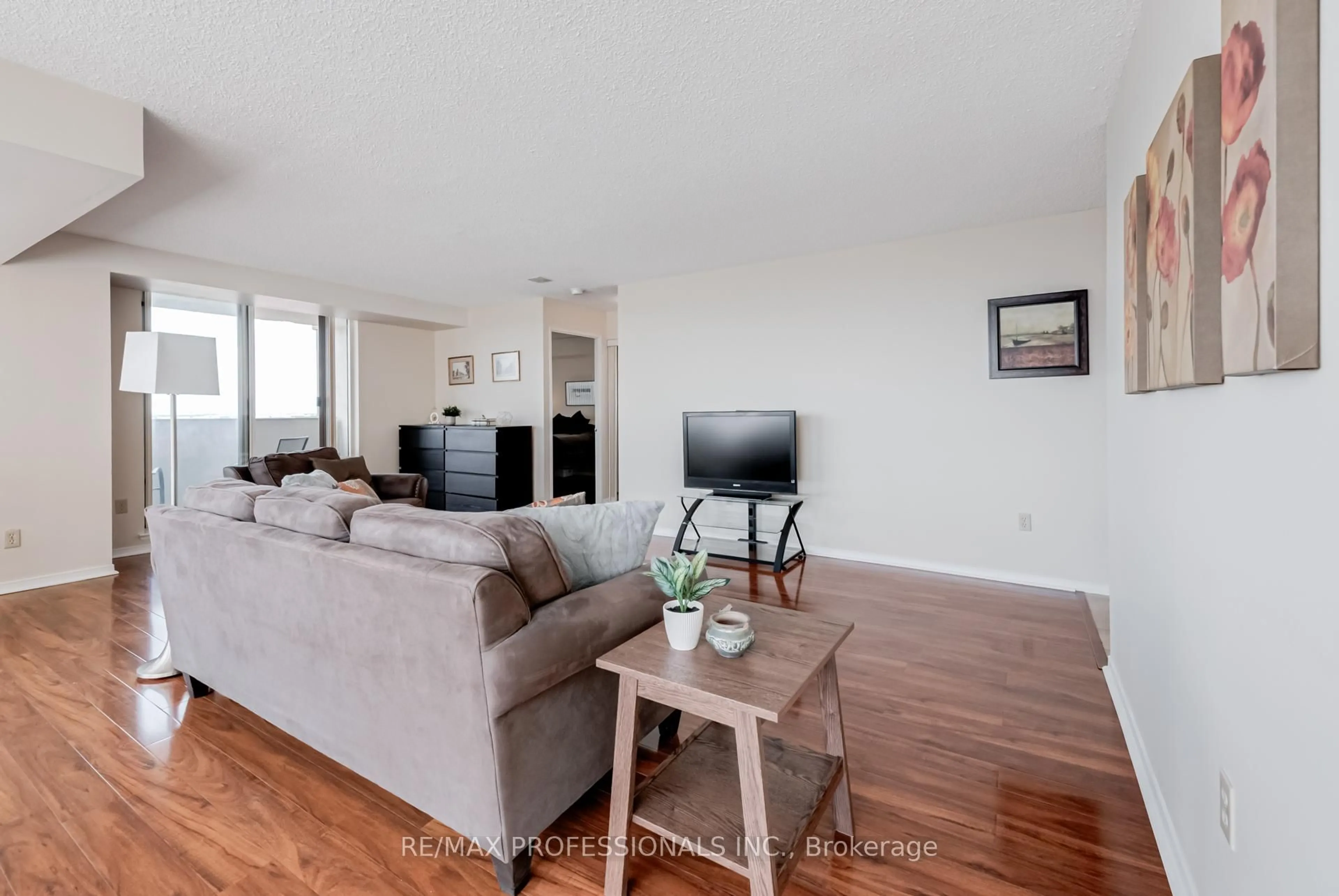 Living room with furniture, unknown for 700 Constellation Dr #1703, Mississauga Ontario L5R 3G8