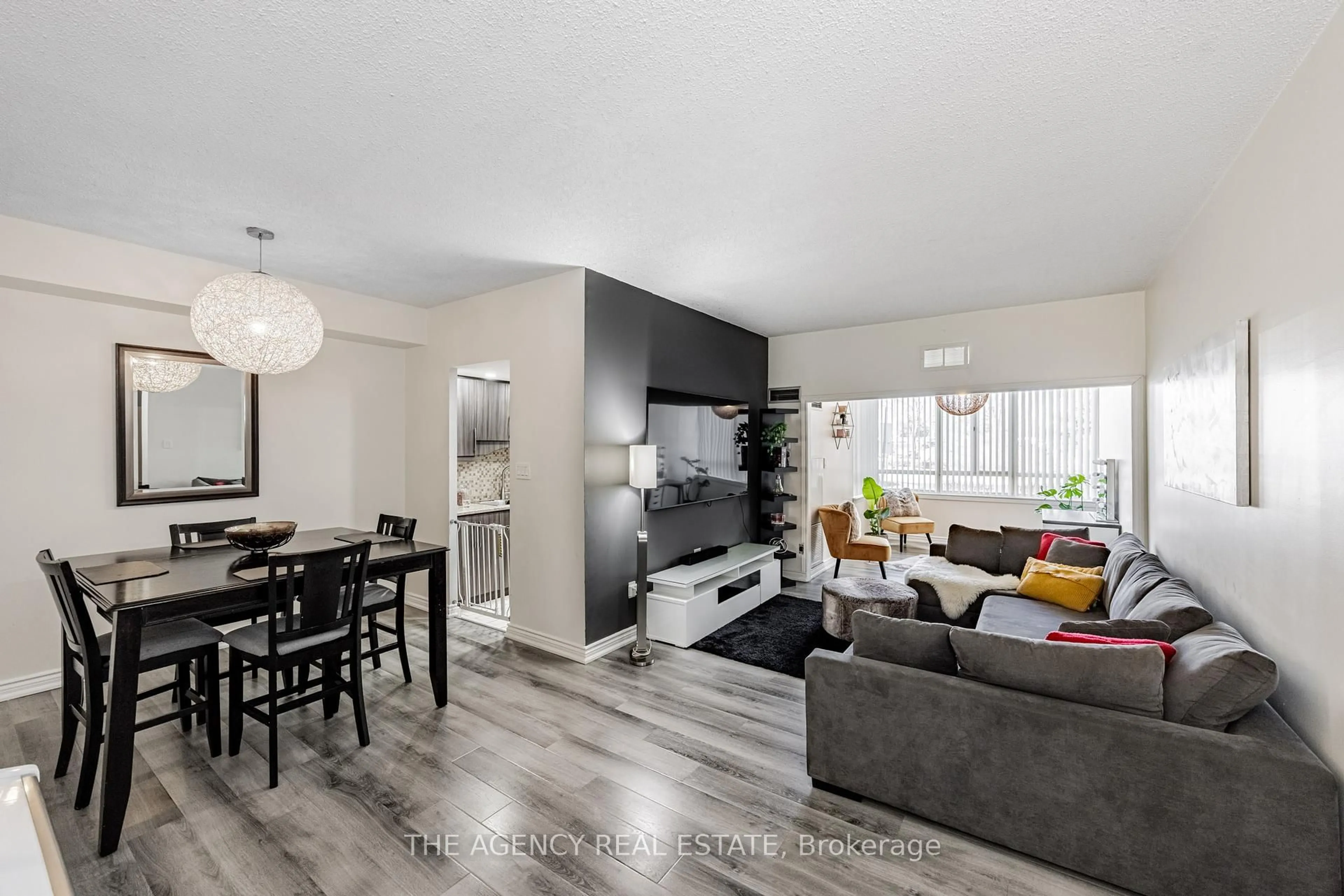 Living room with furniture, unknown for 5 Lisa St #107, Brampton Ontario L6T 4T4