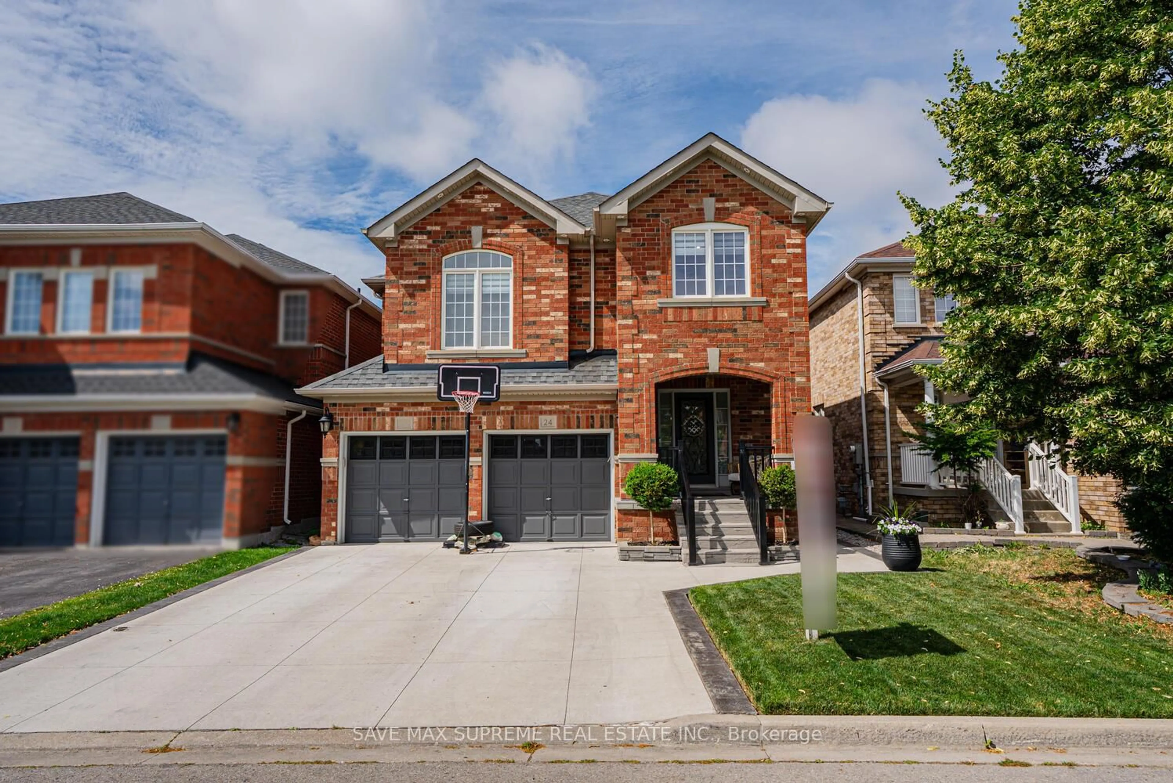 Home with brick exterior material, street for 24 Silver Egret Rd, Brampton Ontario L7A 3P4