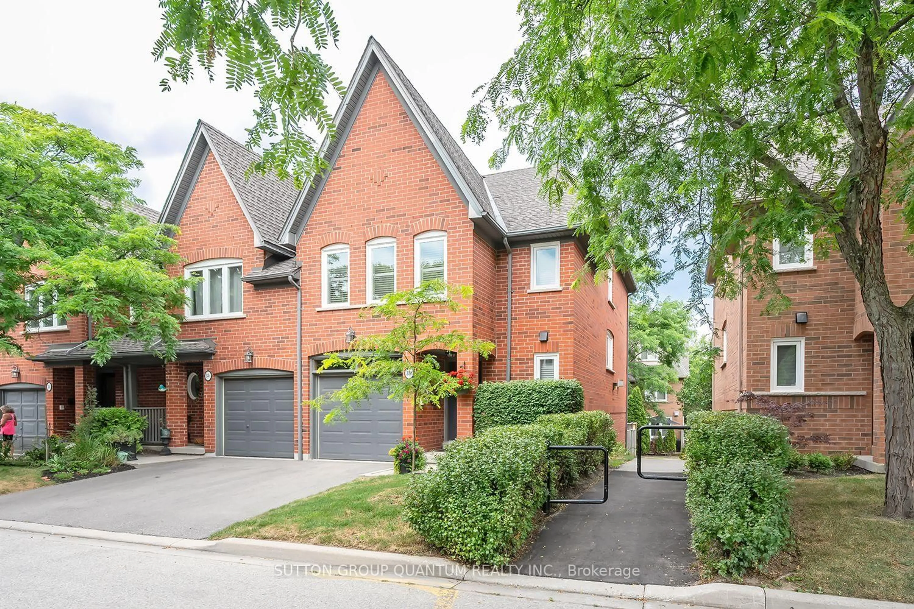 Home with brick exterior material, street for 1064 Queen St #35A, Mississauga Ontario L5H 4K3