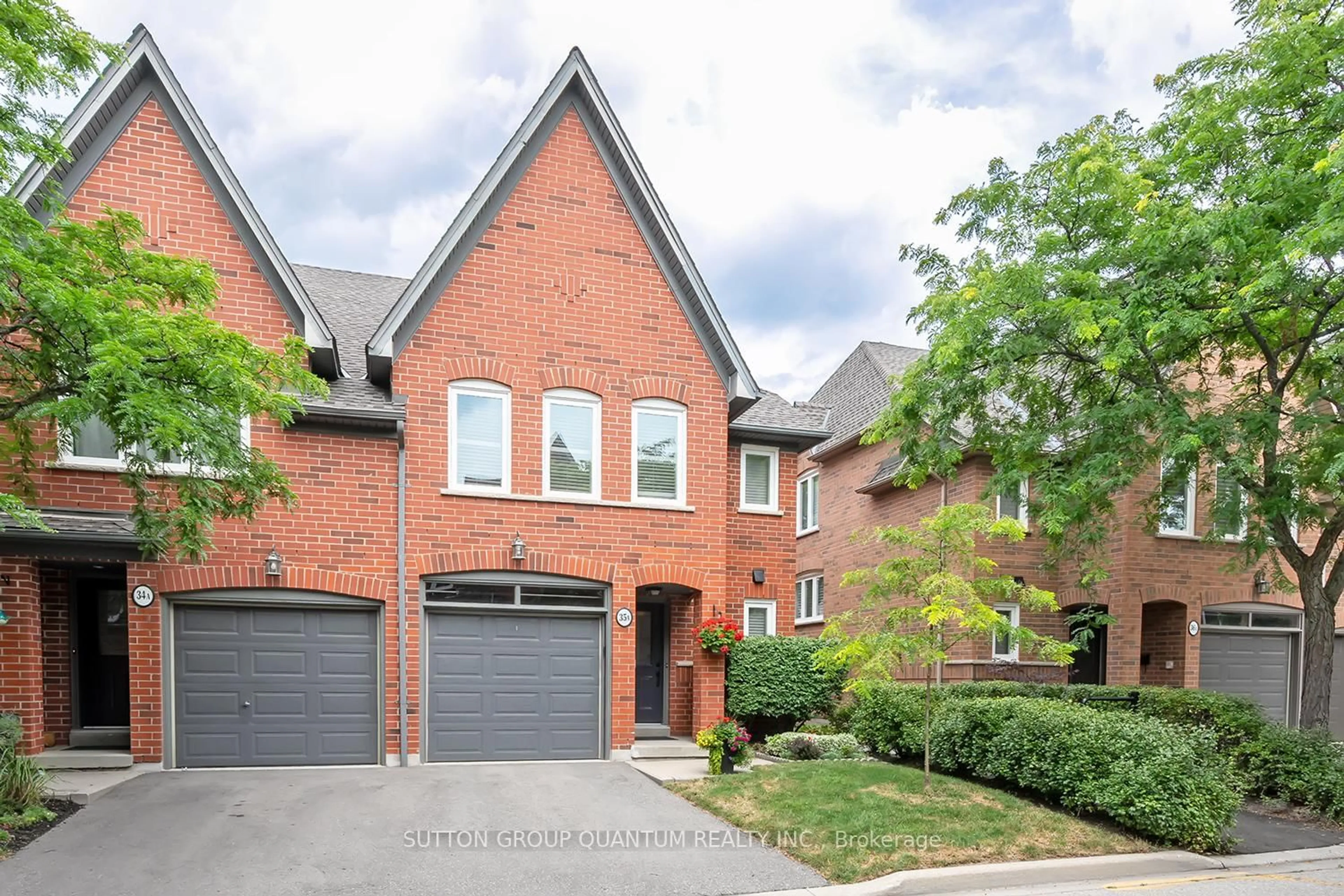 Home with brick exterior material, street for 1064 Queen St #35A, Mississauga Ontario L5H 4K3