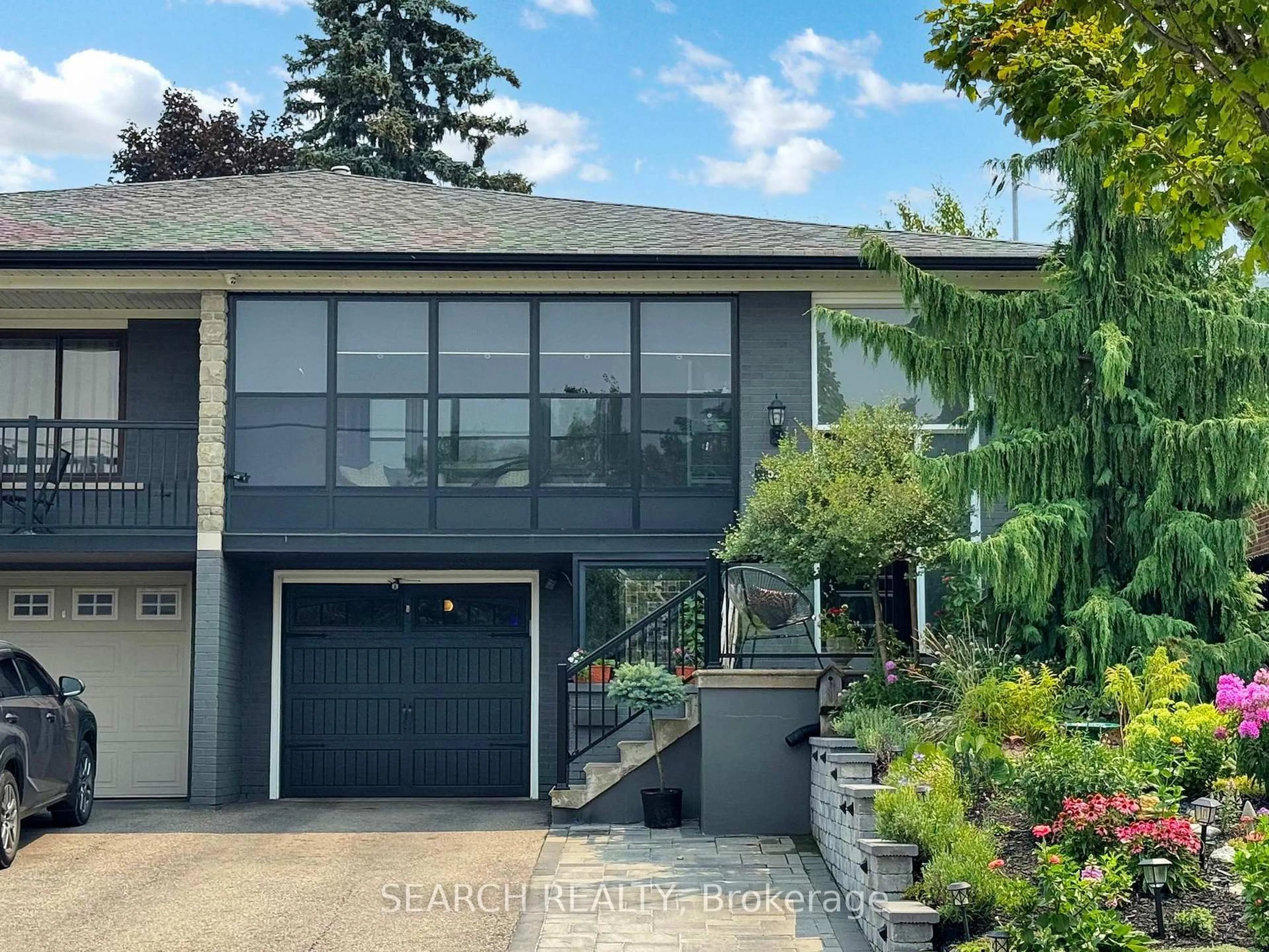 Home with vinyl exterior material, street for 559 Roding St, Toronto Ontario M3M 2A4