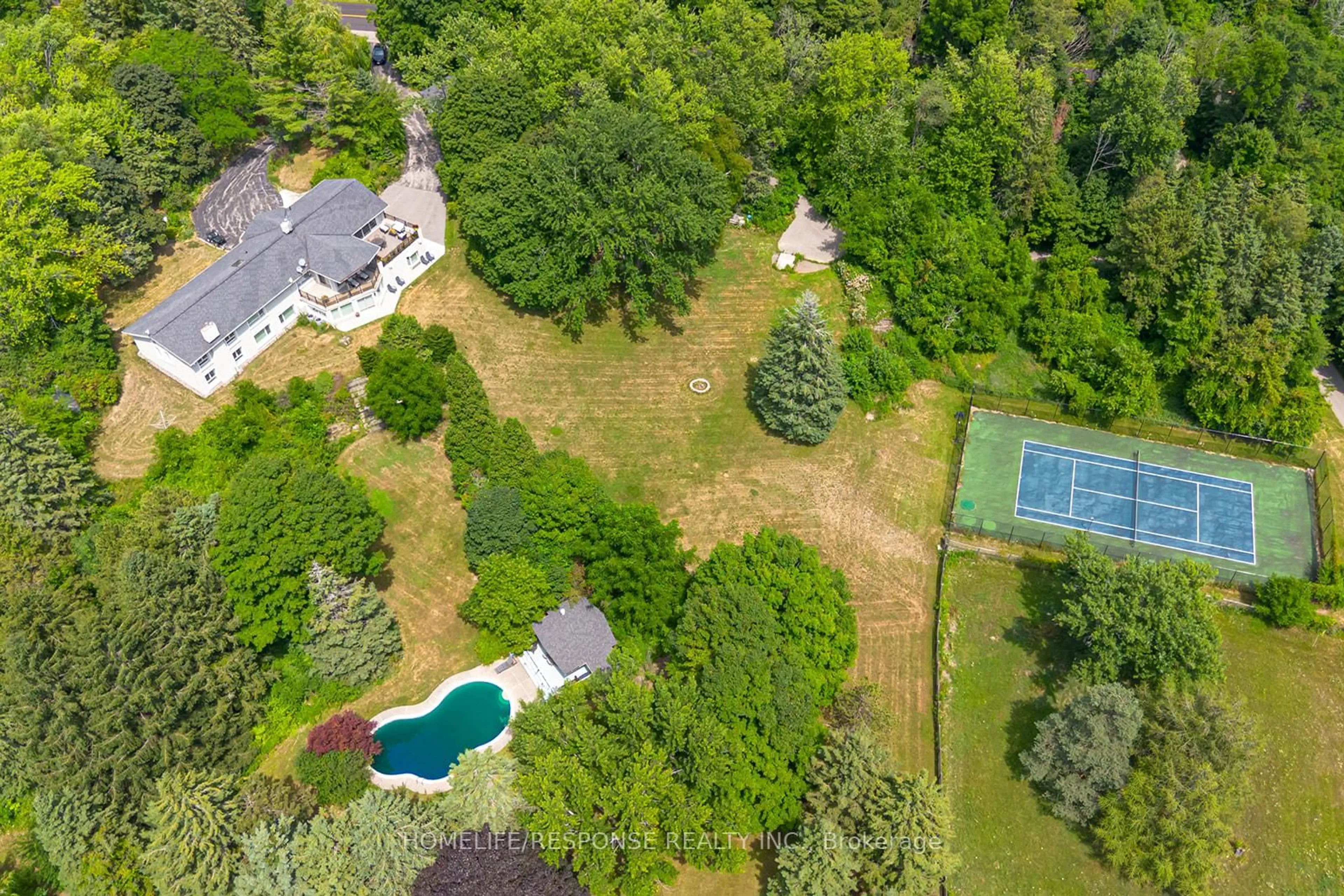 A pic from outside/outdoor area/front of a property/back of a property/a pic from drone, forest/trees view for 16672 CENTREVILLE CREEK Rd, Caledon Ontario L7C 3B5